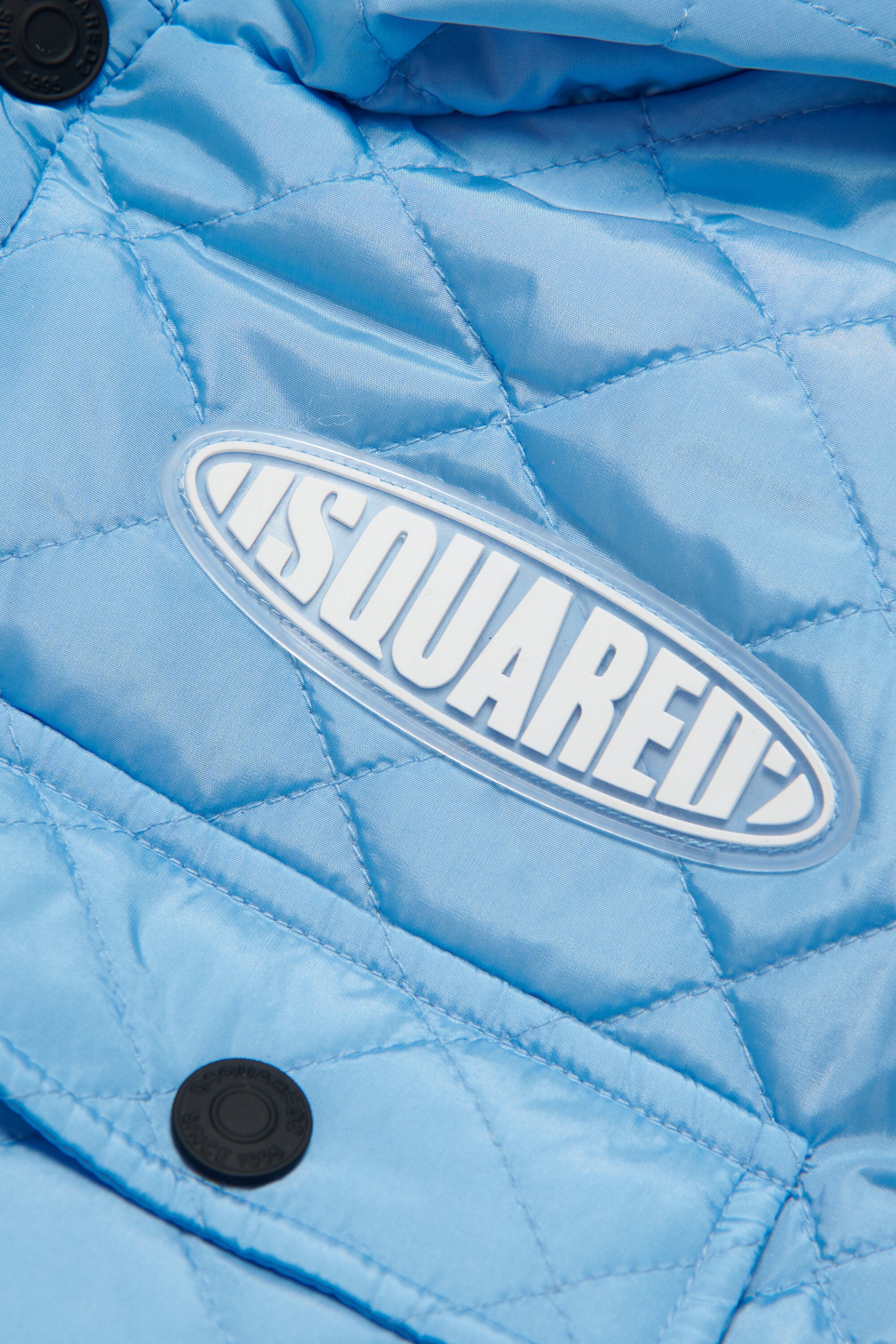 Sleeveless padded jacket branded with surf logo patch