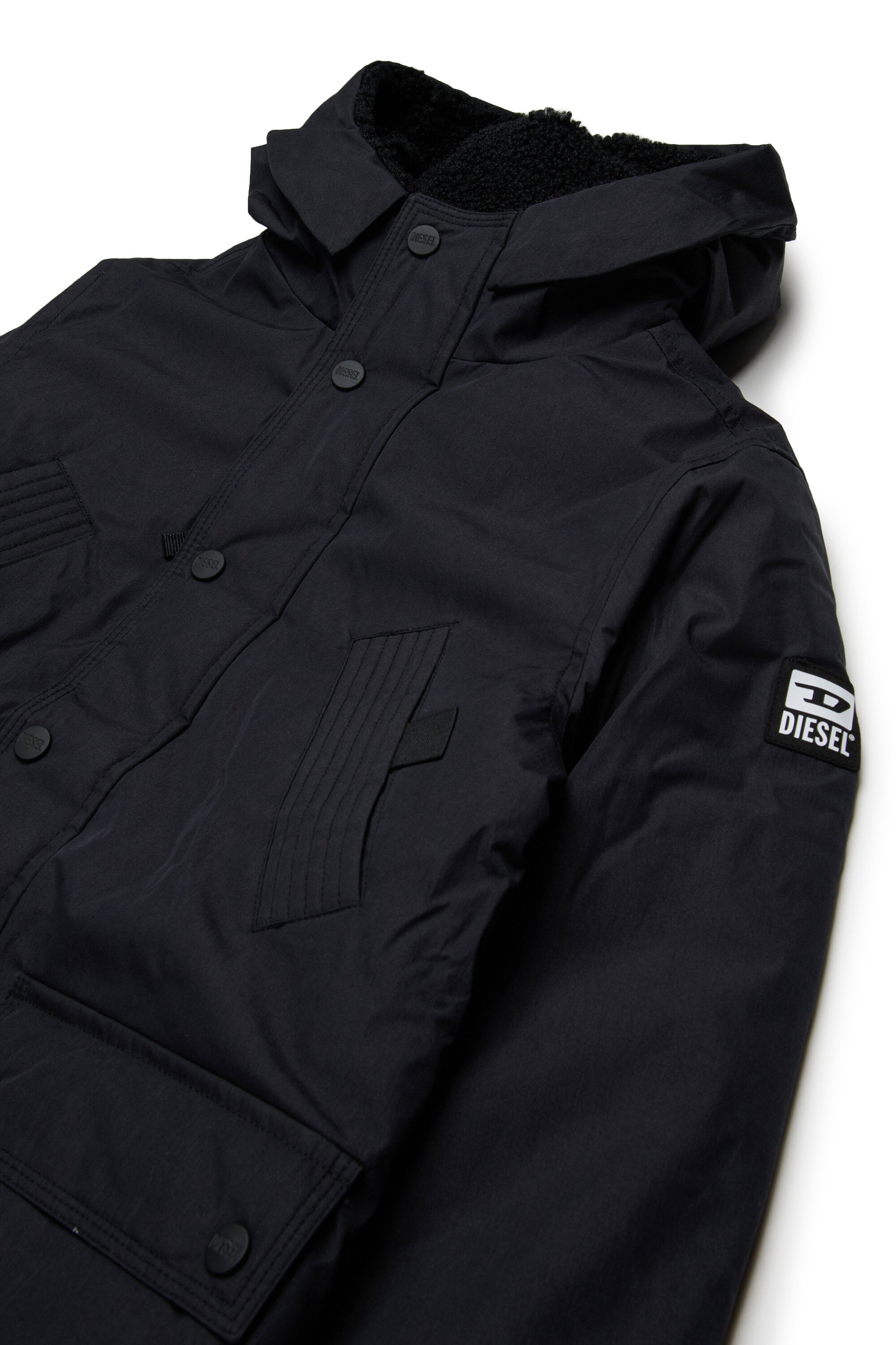 Lange gepolsterte Jacke mit Vordertaschen