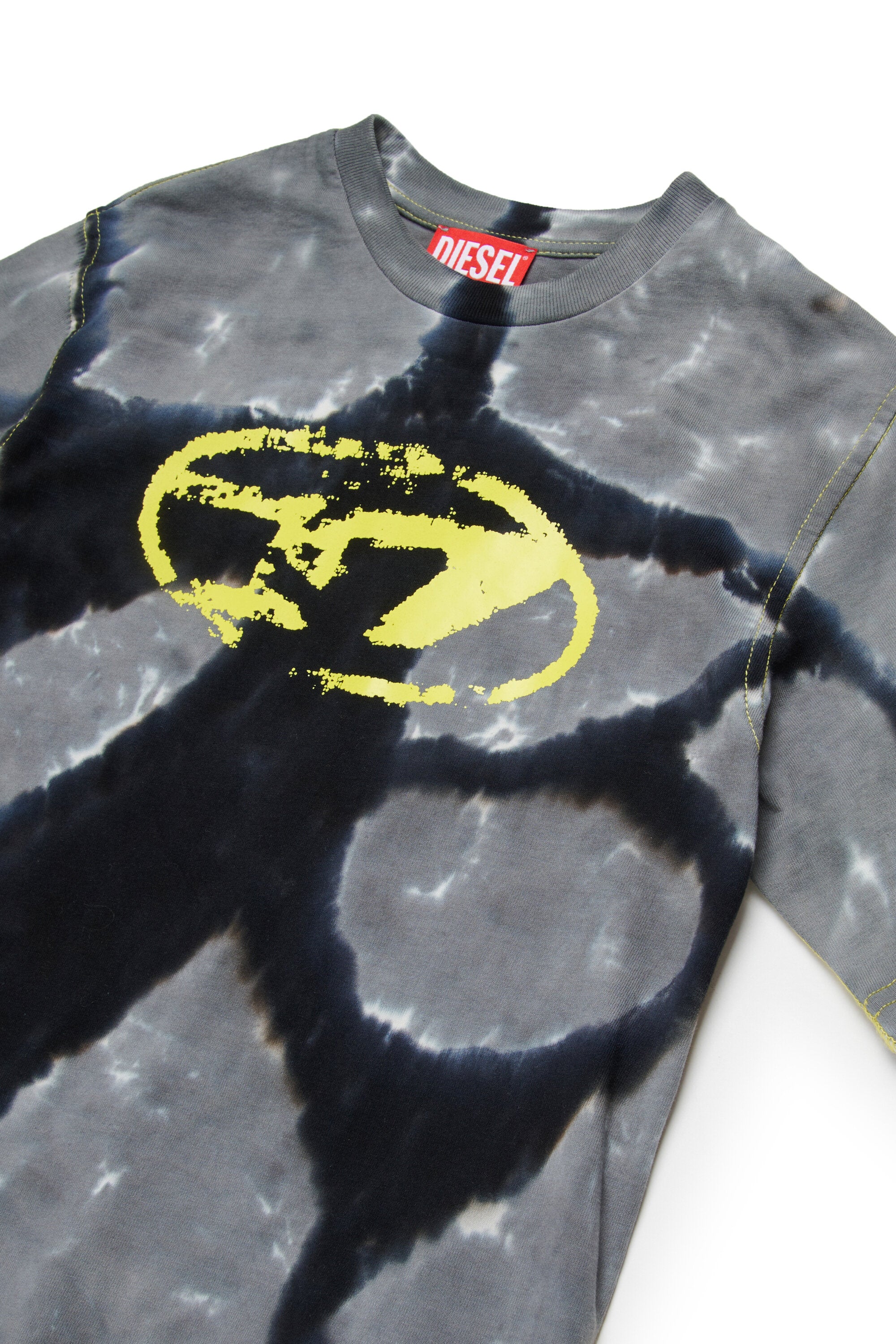 Batik T-shirt branded with Oval D logo