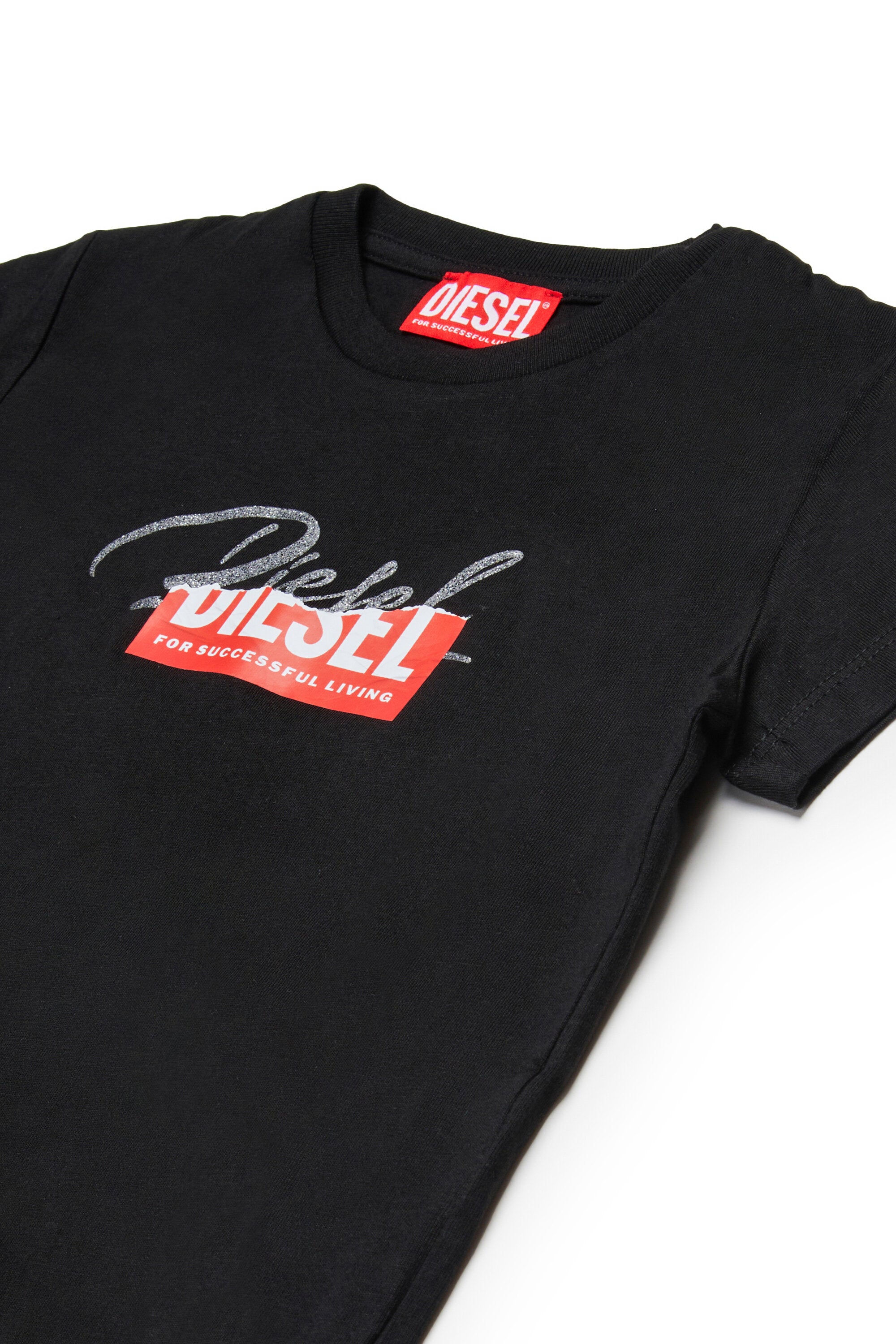 T-shirt in jersey con logo glitter sovrapposto