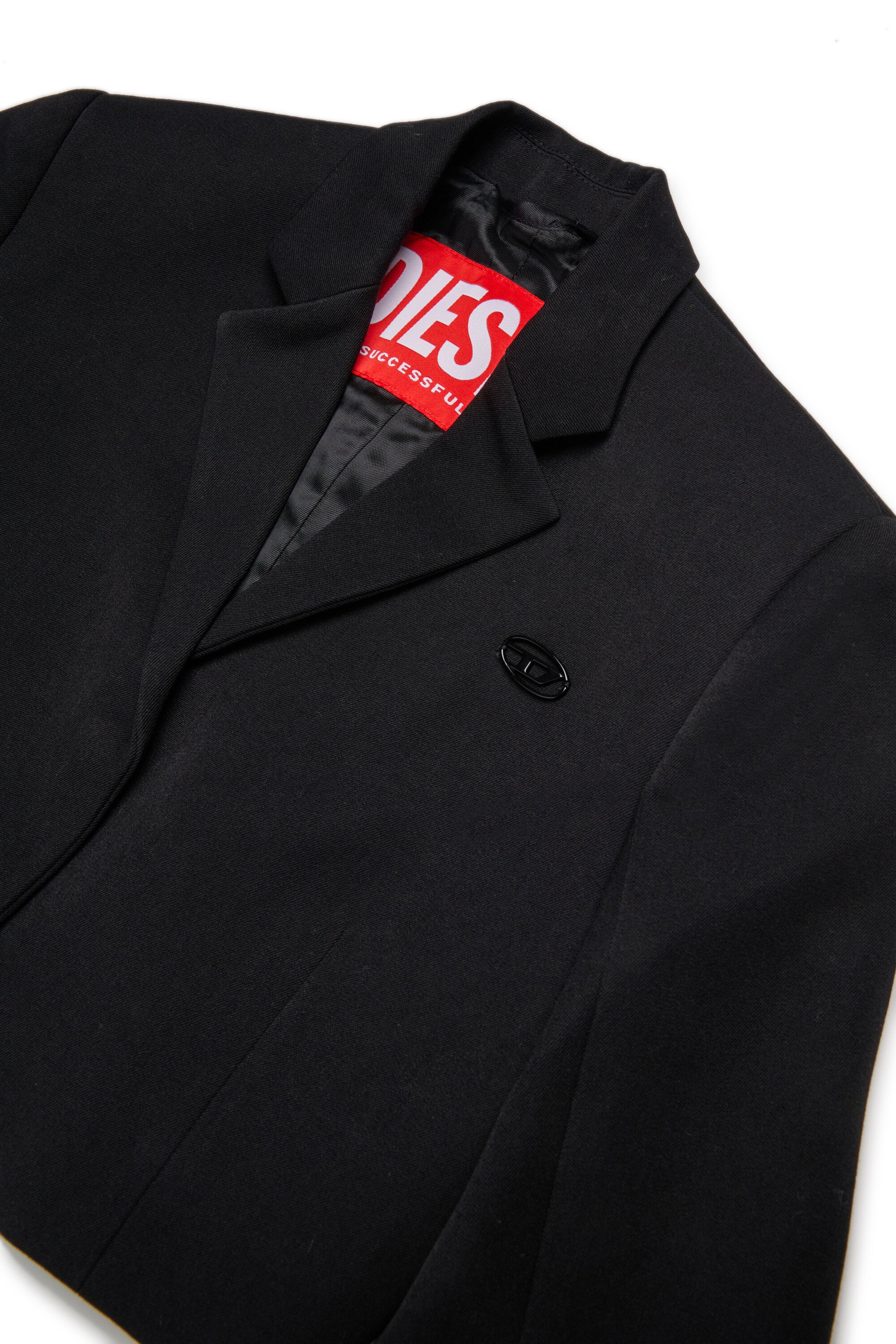 Chaqueta blazer recortada de lana fría