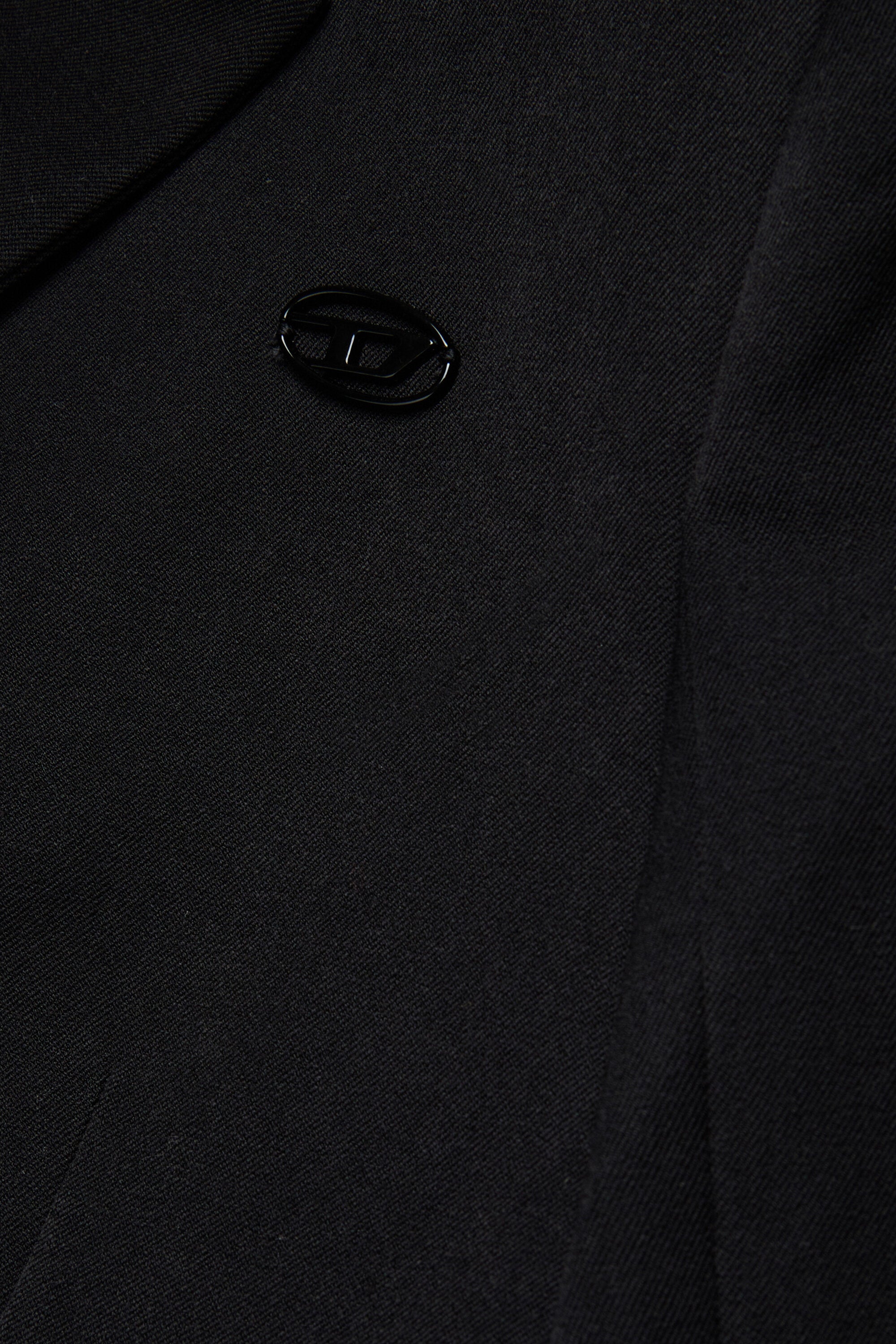 Chaqueta blazer recortada de lana fría