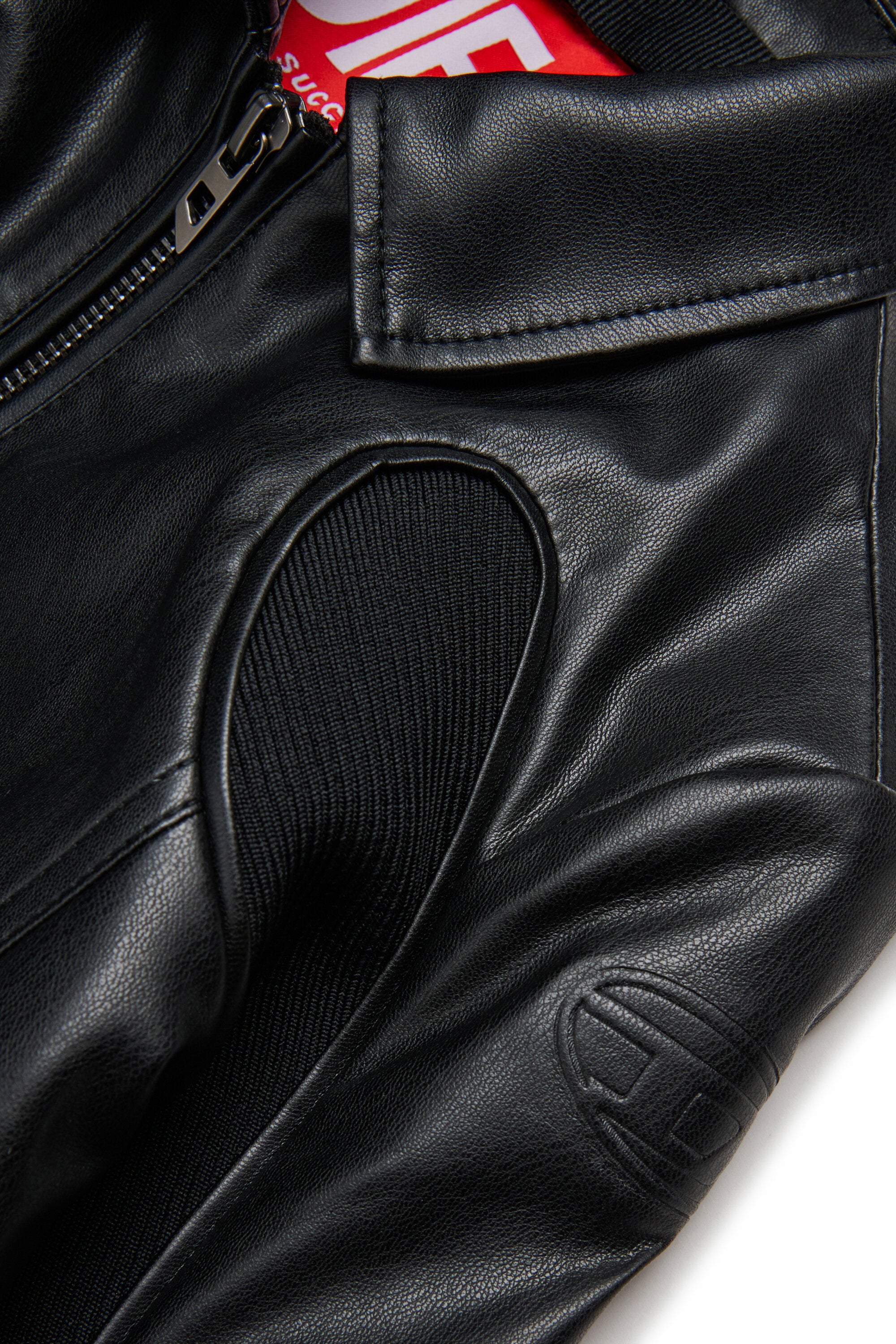 Chaqueta de tejido revestido con inserciones elásticas