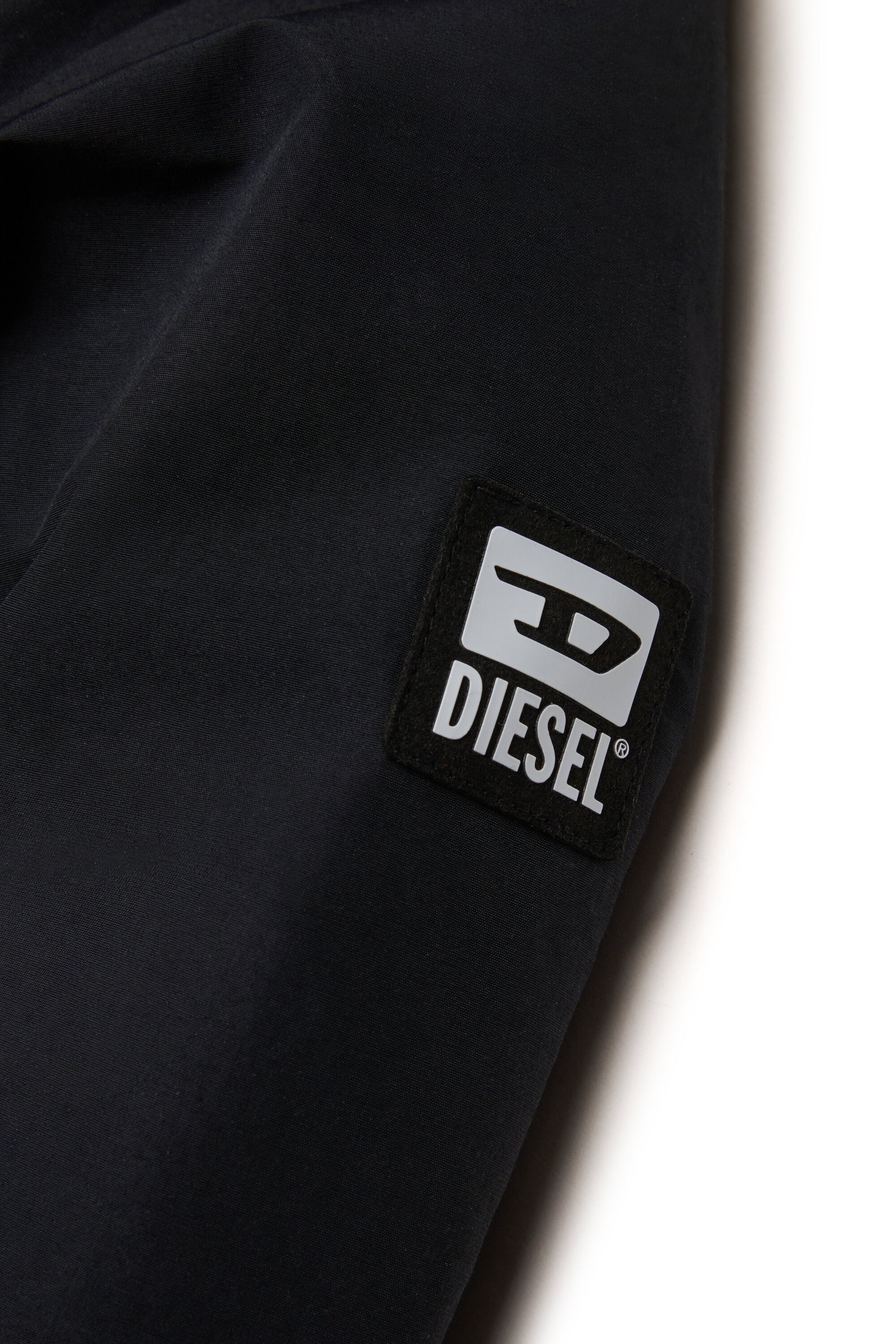 Steppjacke mit Kunstpelzkapuze und Taschen