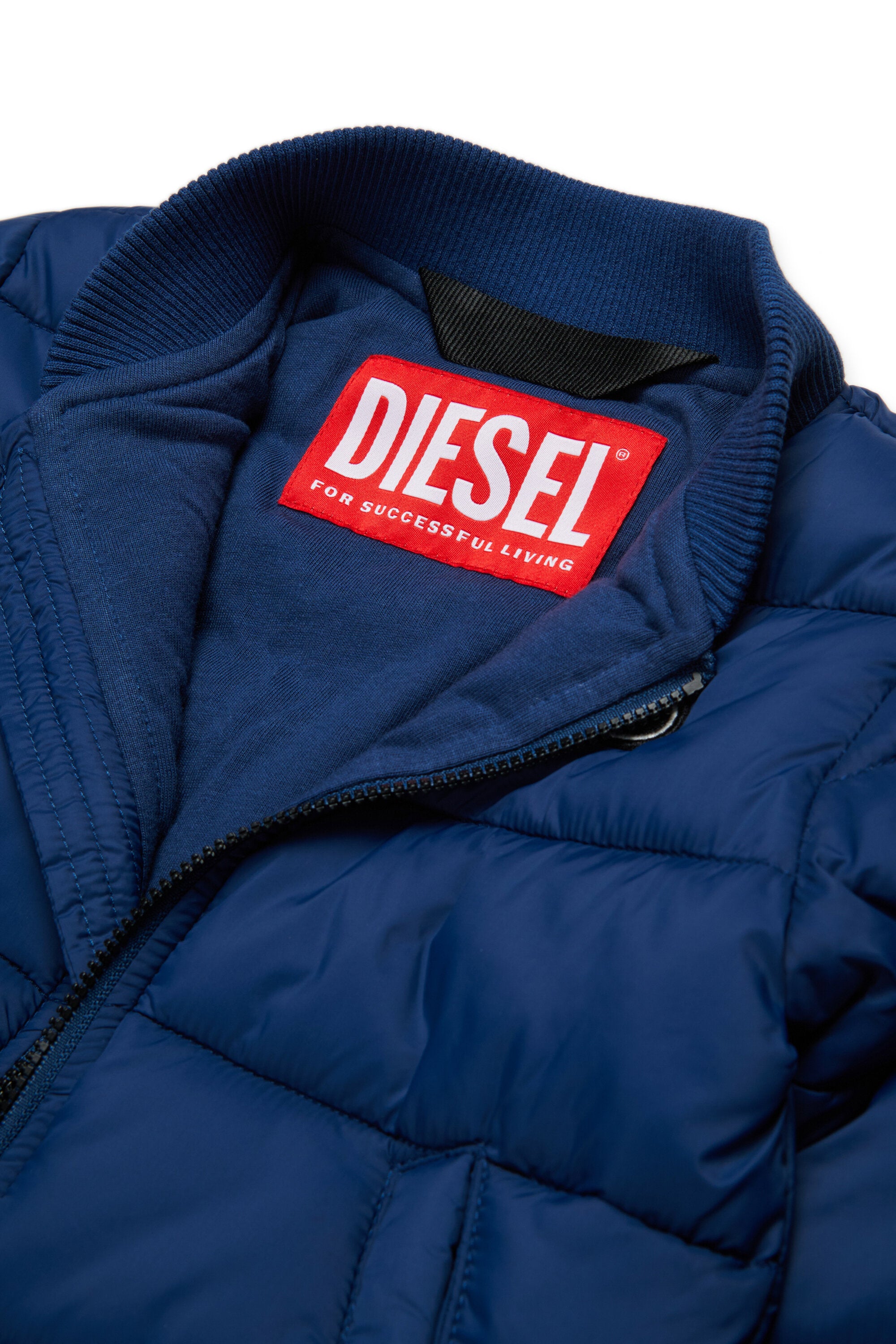 Veste courte matelassée avec patch Oval D