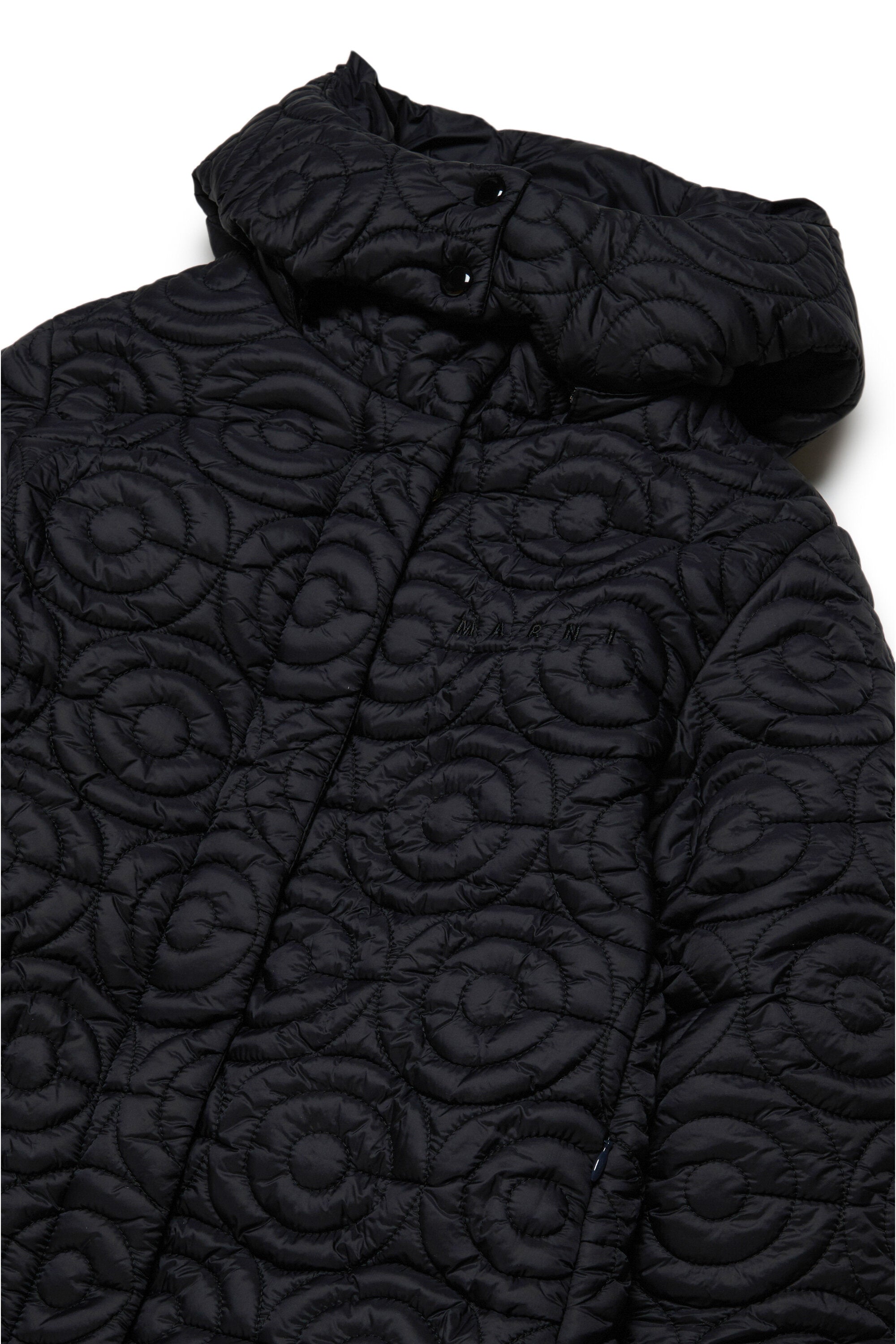 Long padded jacket with allover quilting in circles