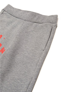 Pantaloni jogger in felpa con melted logo