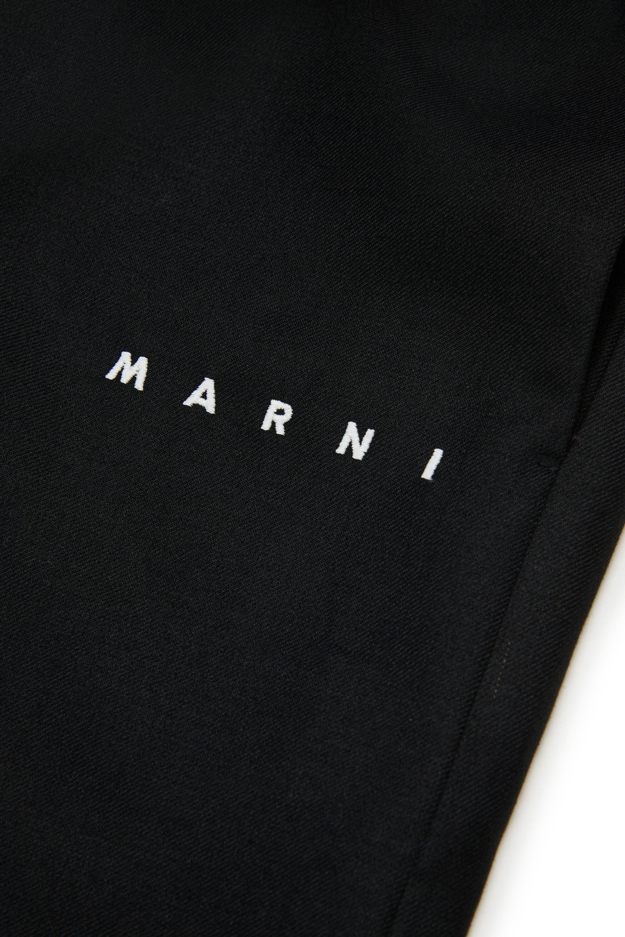 Pantaloni wide leg in flanella con logo