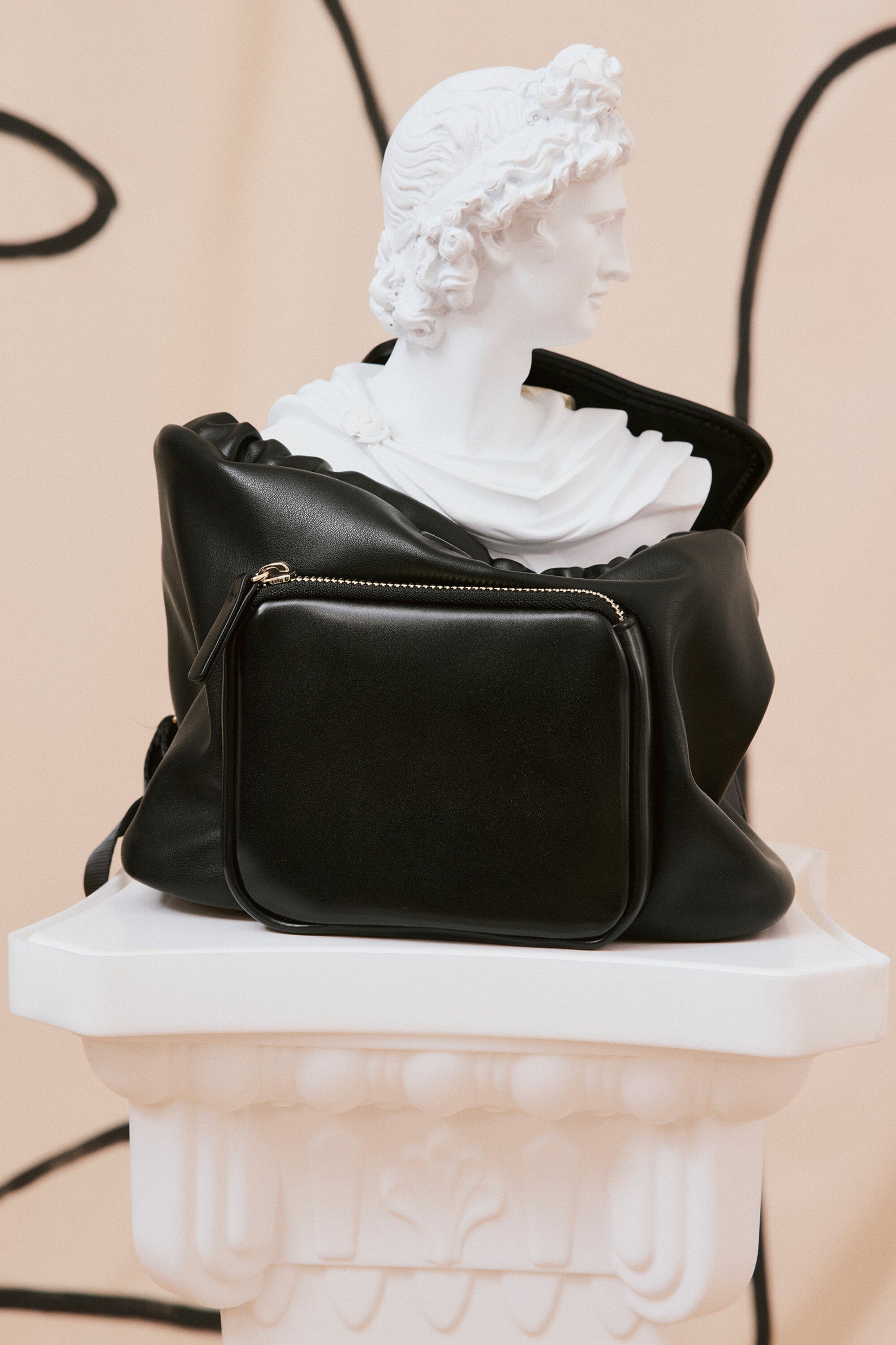 Coated fabric backpack with logo