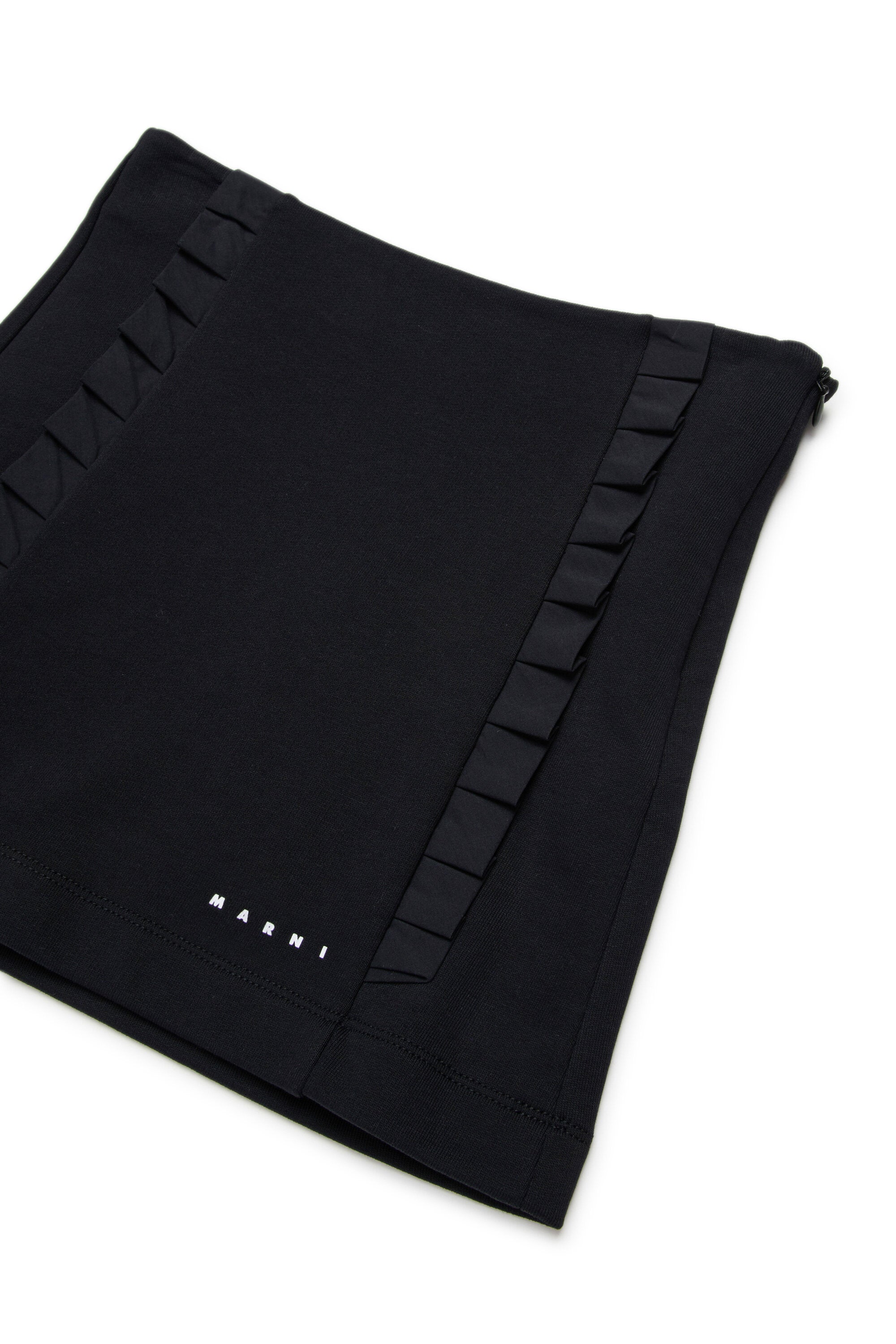 Mini skirt with pleated details