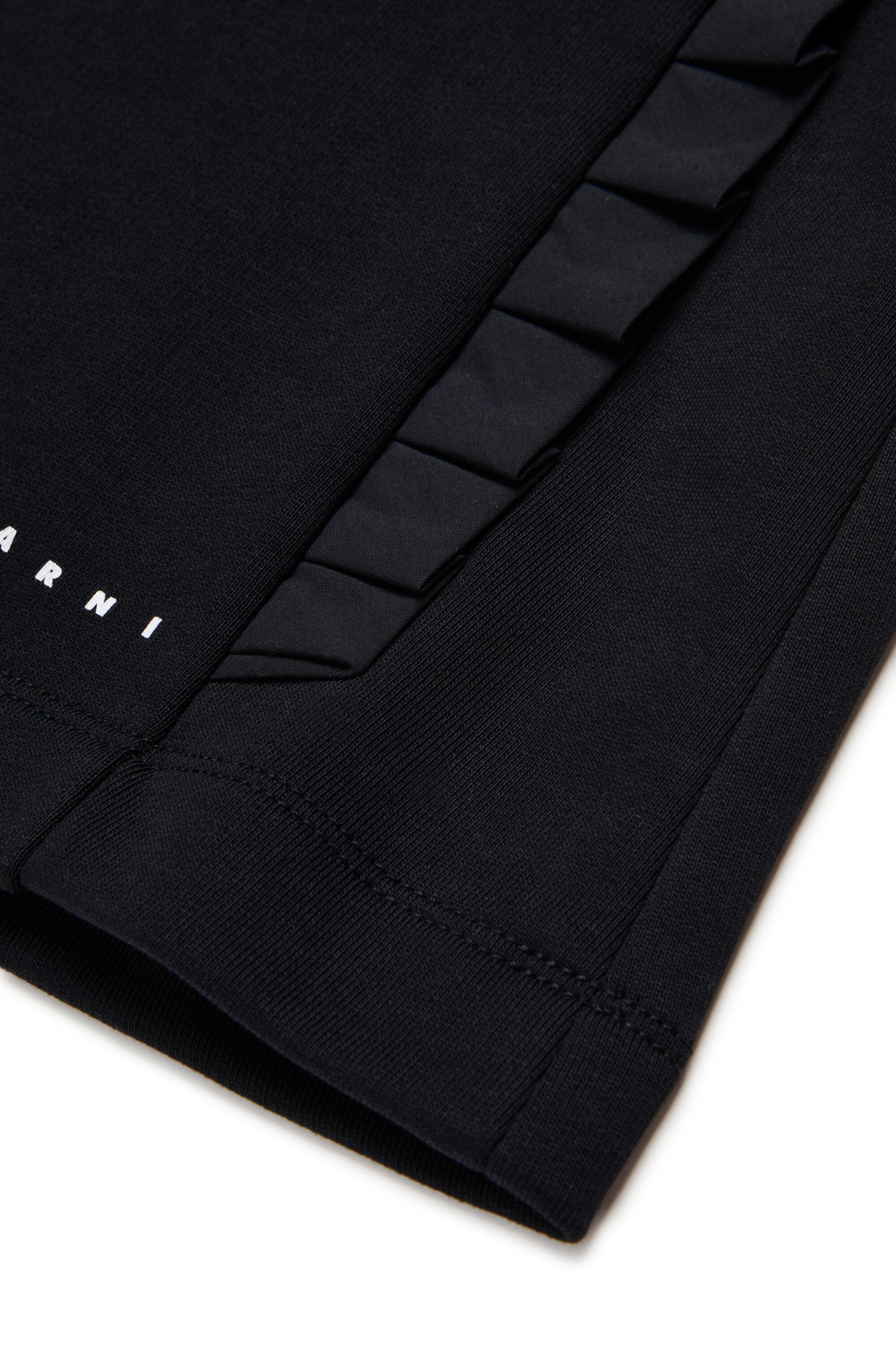 Mini-jupe avec détails plissés