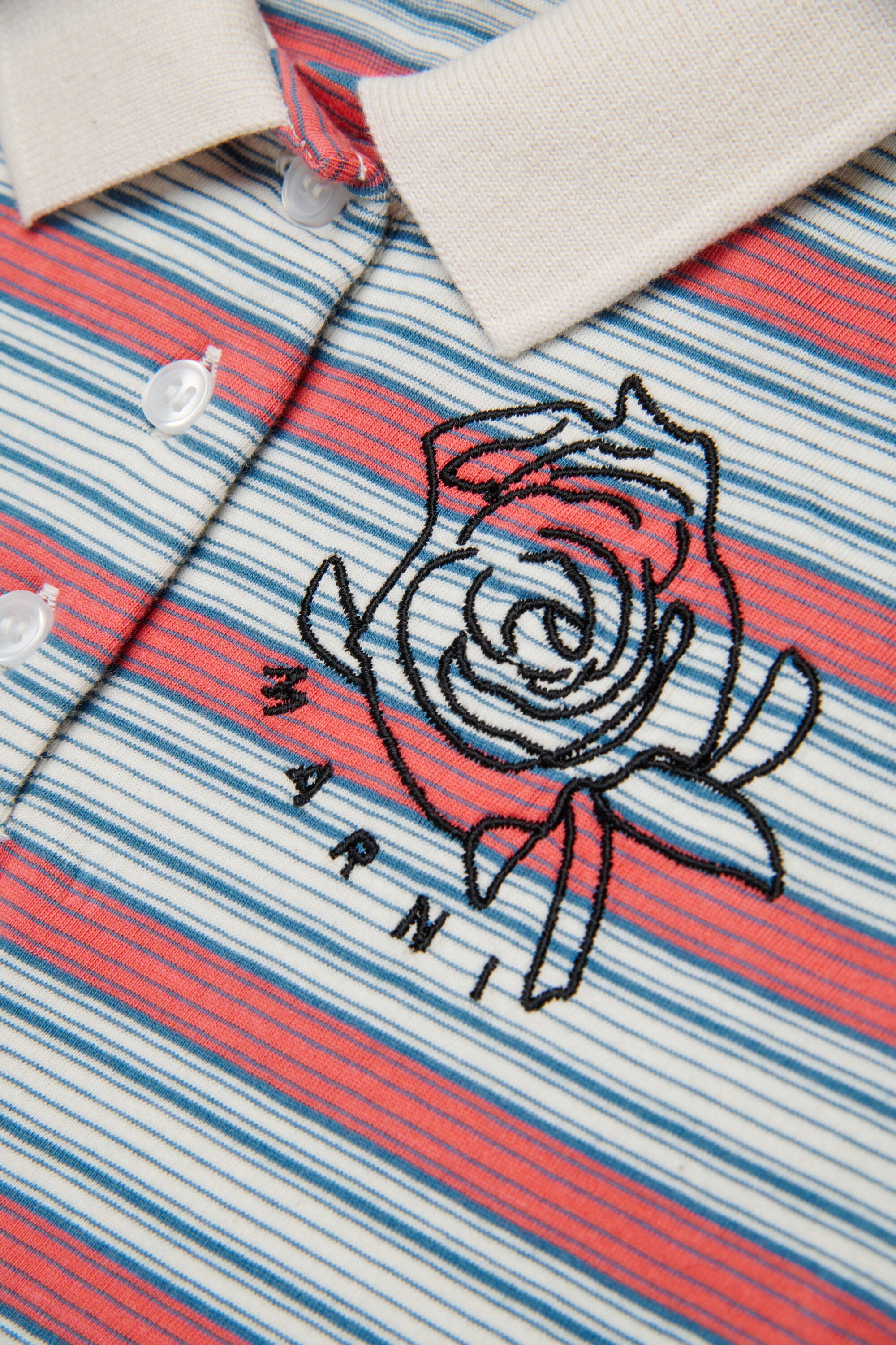 Polo a righe con logo
