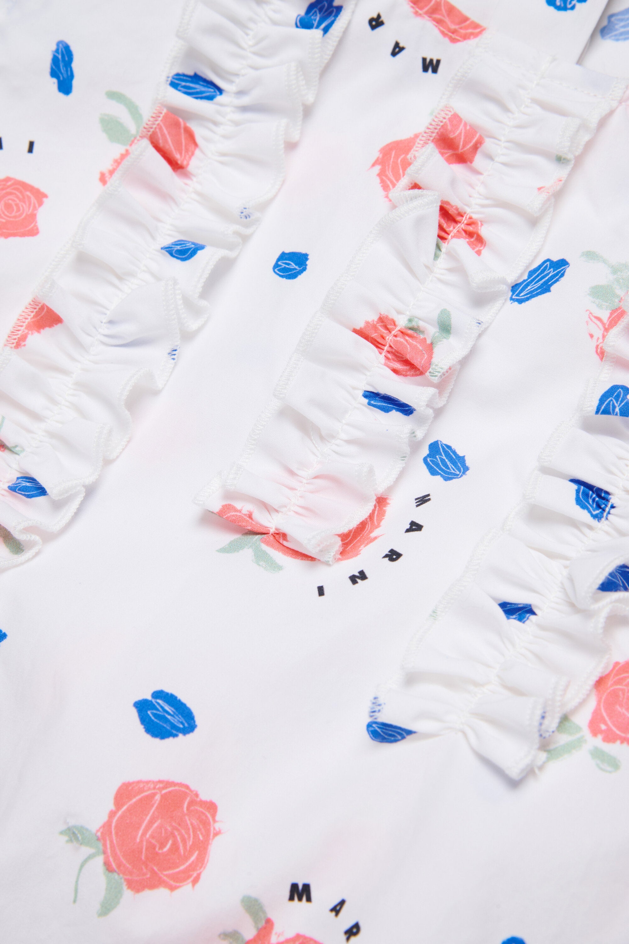 Camisa sin mangas con volantes