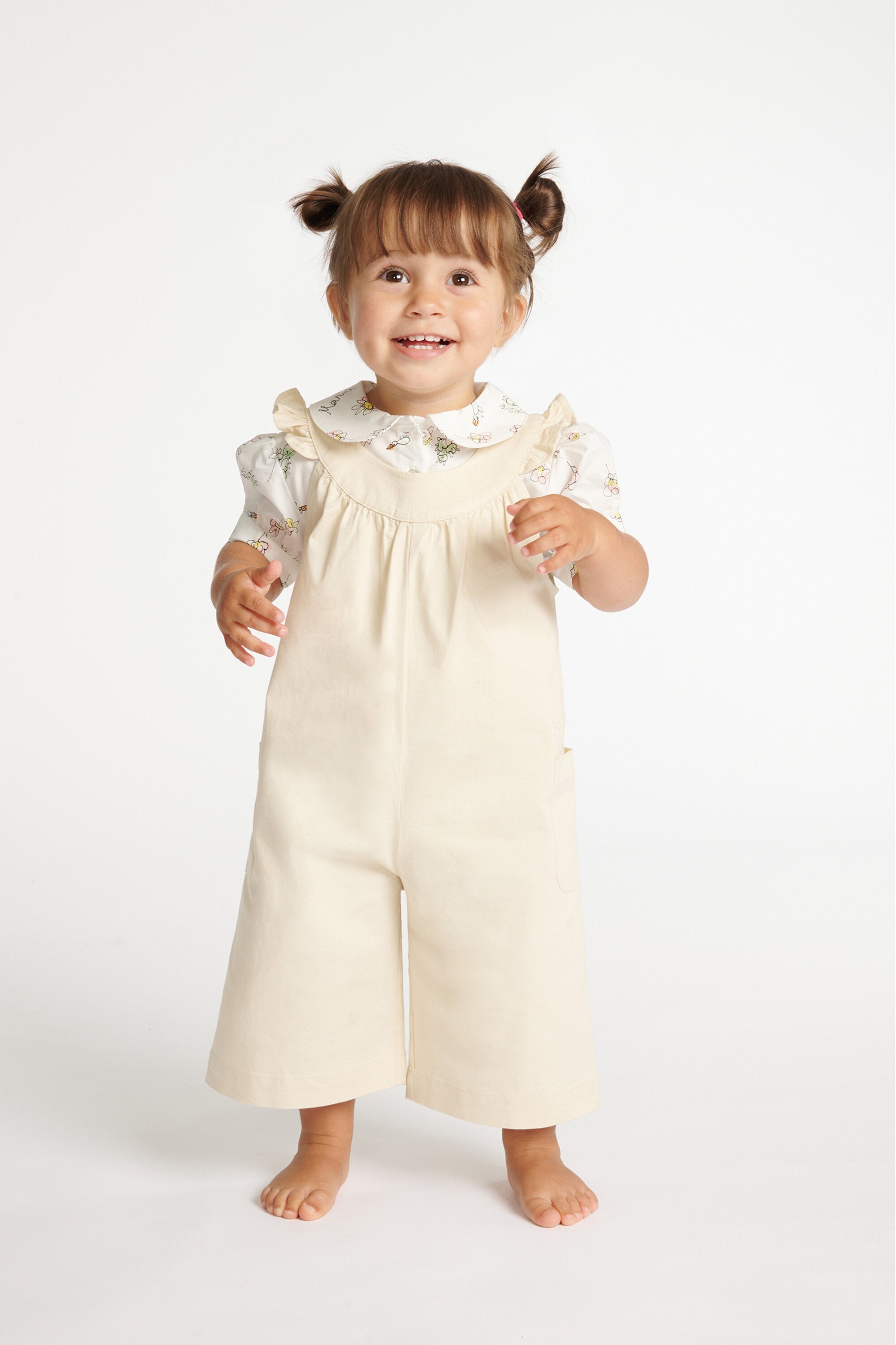 Tuta con ruches sulle spalle