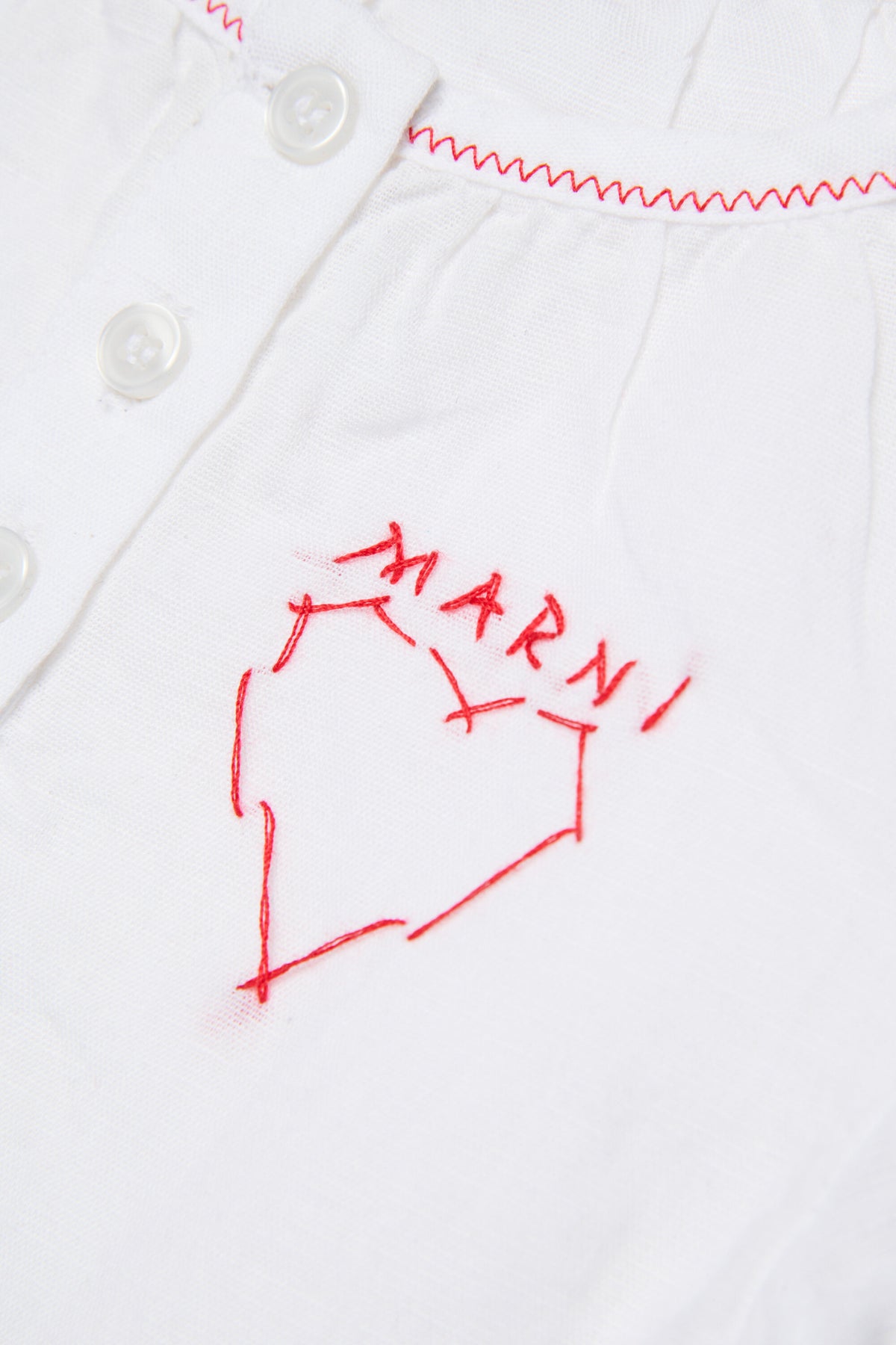 Short dress with embroidered logo and heart