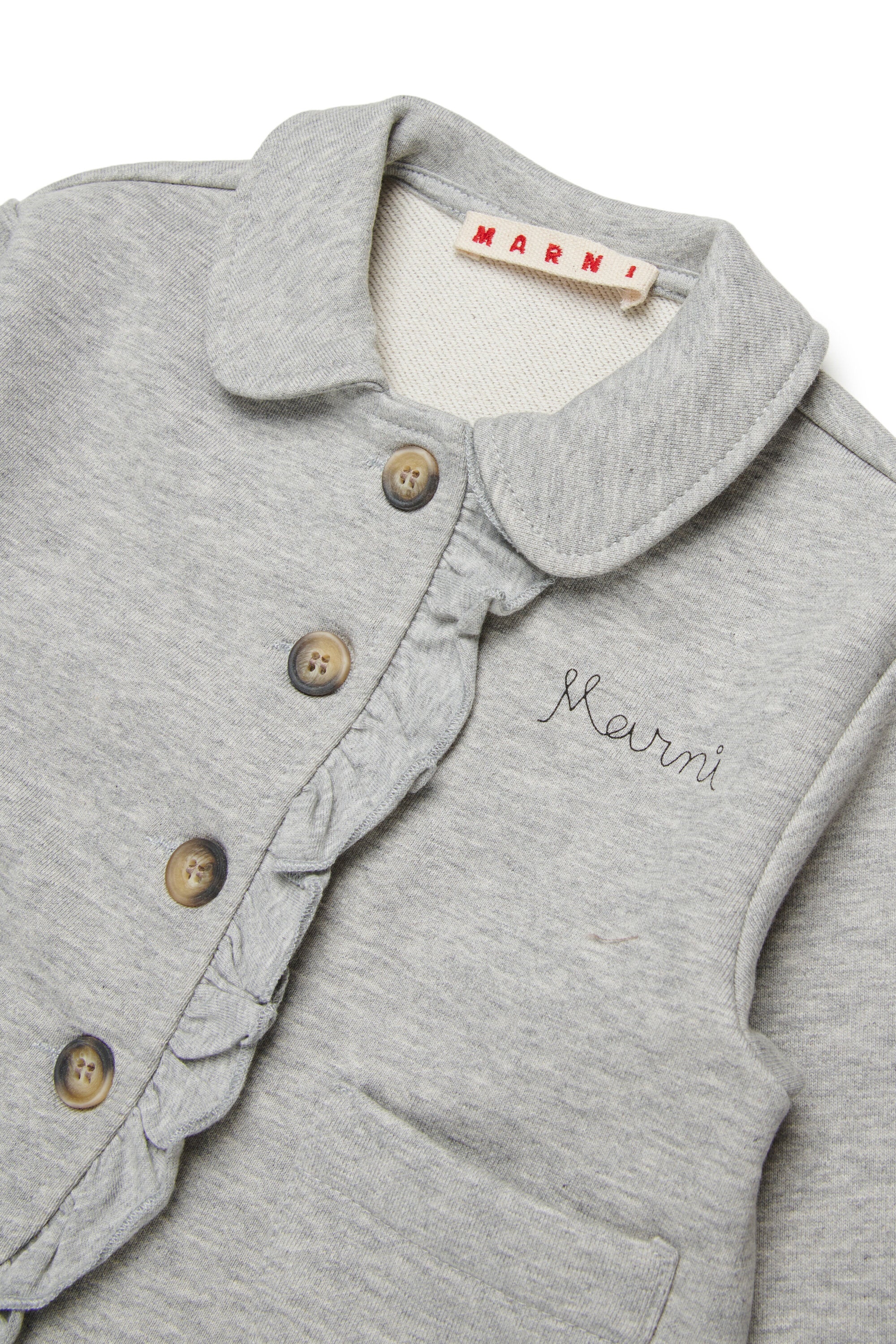 Jacket with ruffles and logo