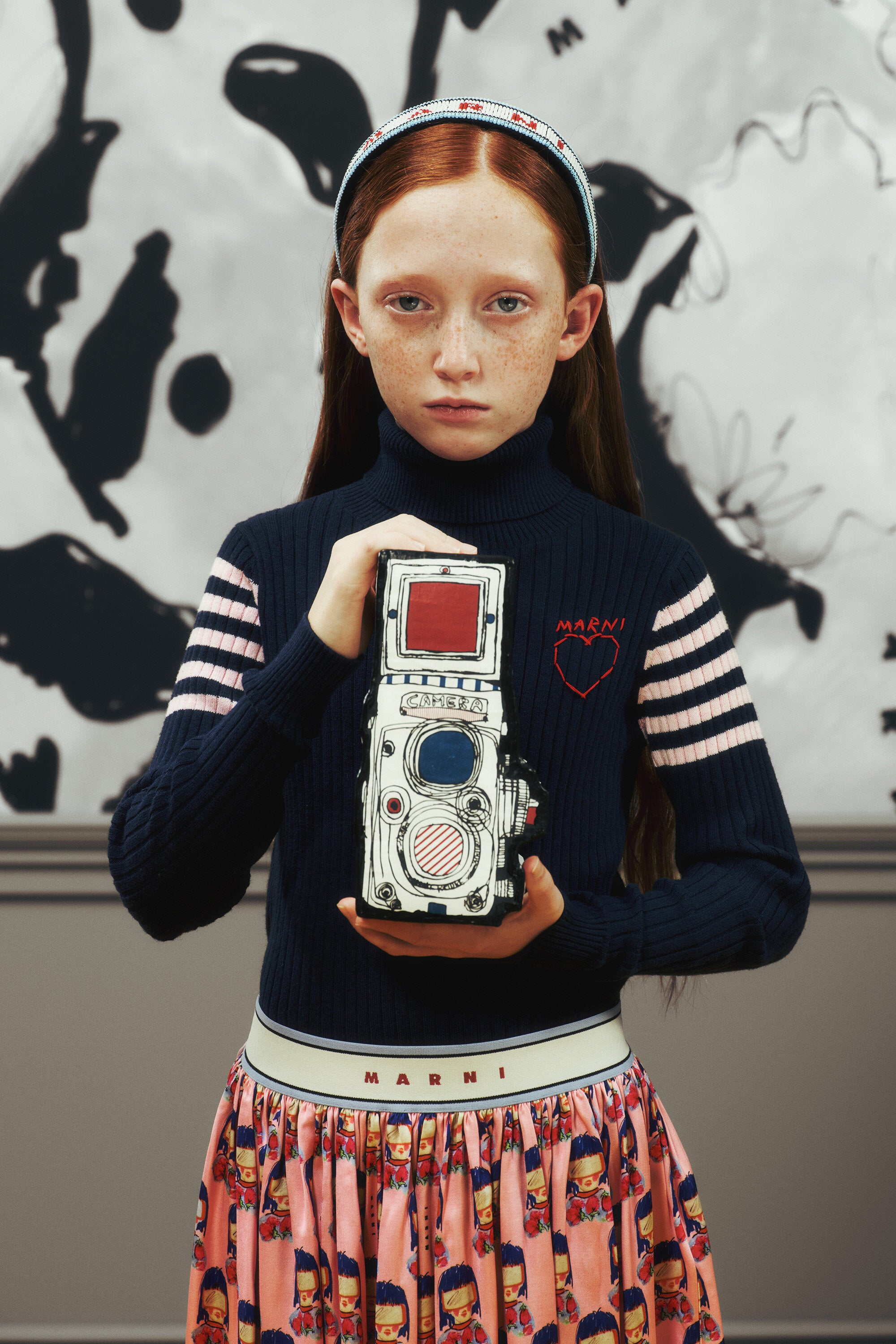 Ribbed turtleneck with heart pattern