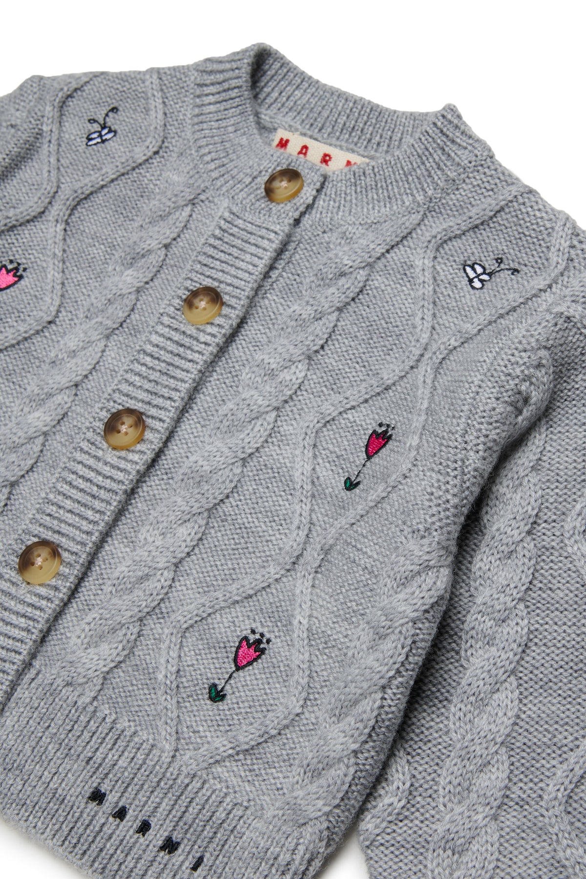 Cardigan con trecce e ricami floreali