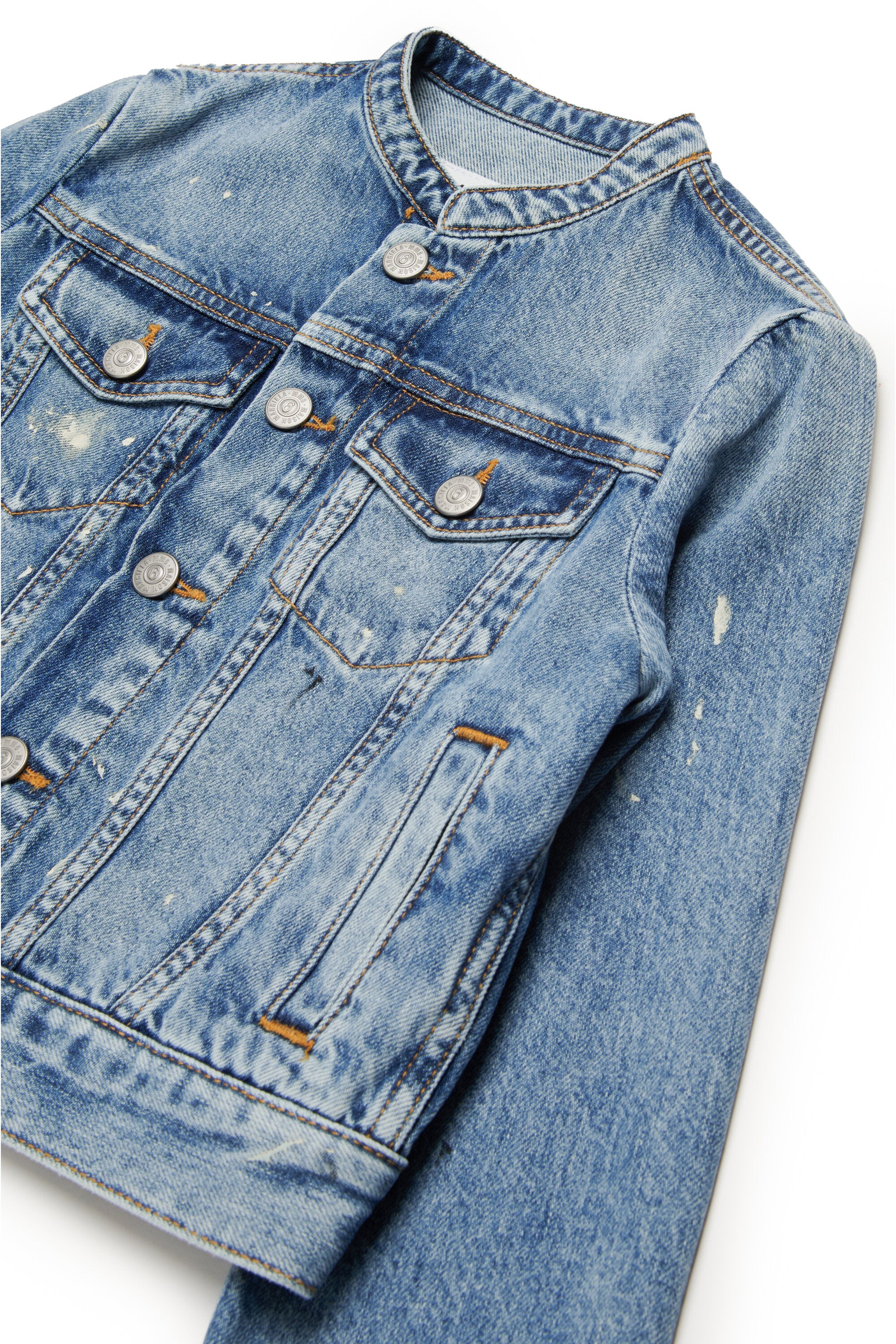 Giacca in denim blu sfumato con color spots