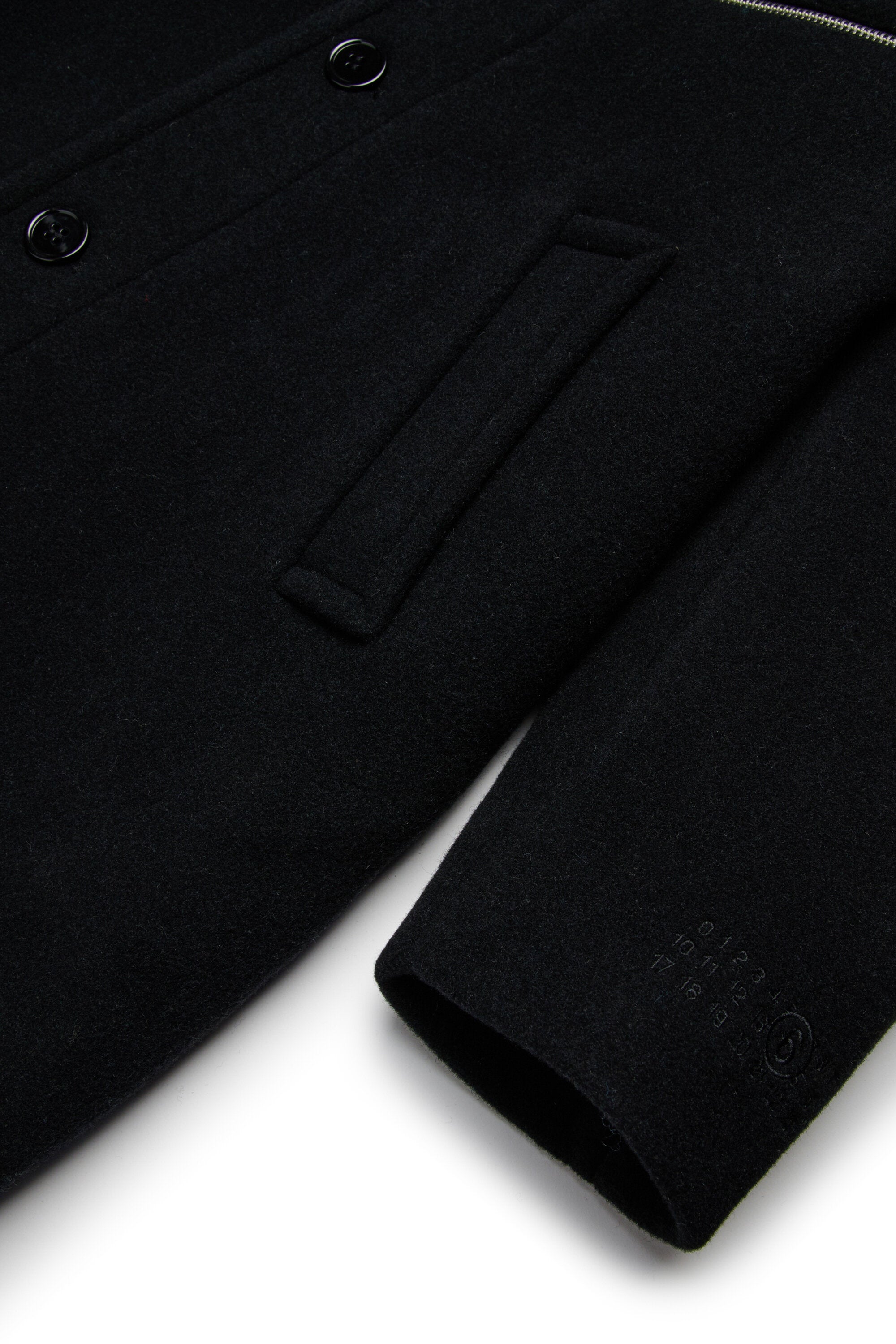 Abrigo largo de paño con cremallera