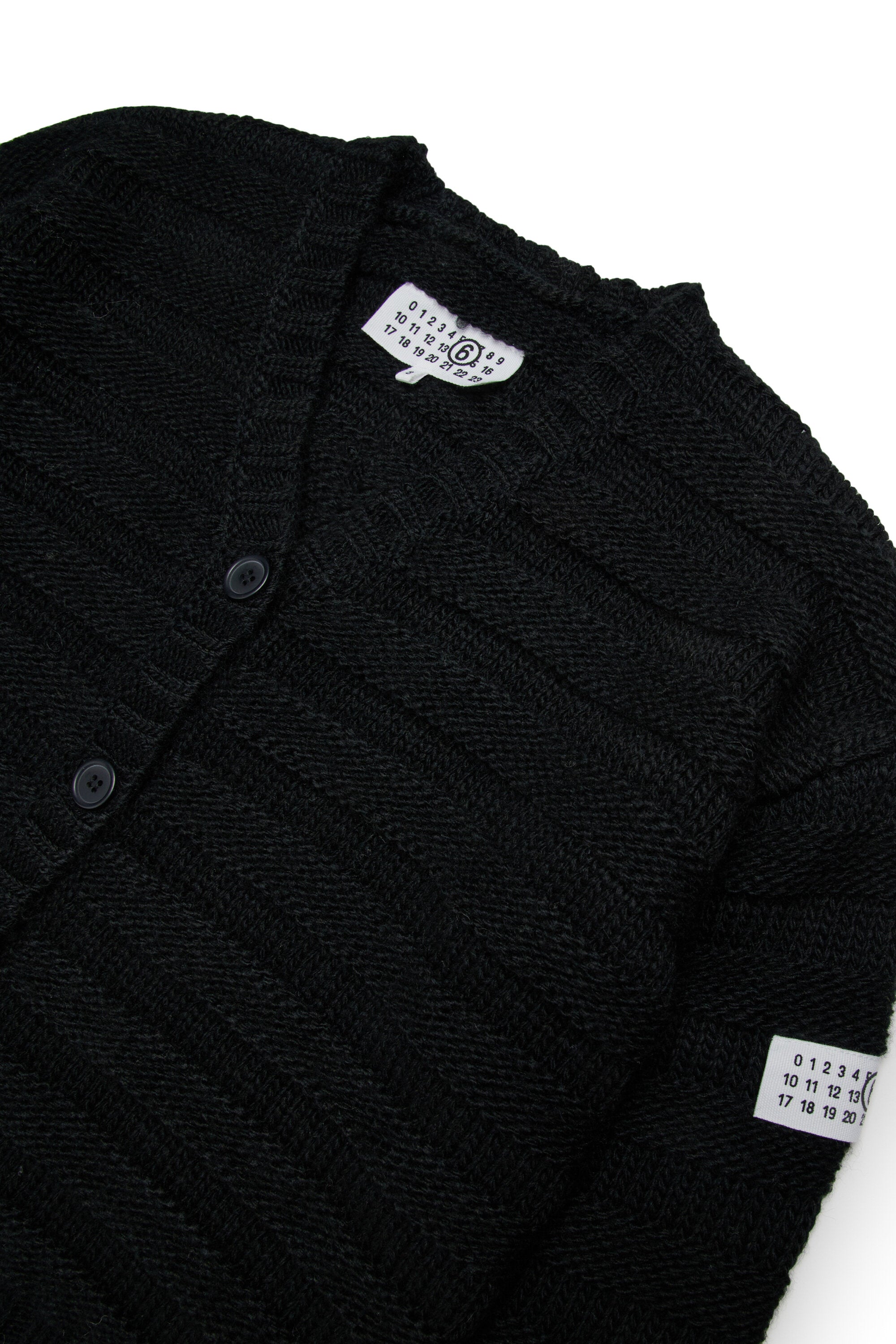 Cardigan in misto lana a coste con rotture