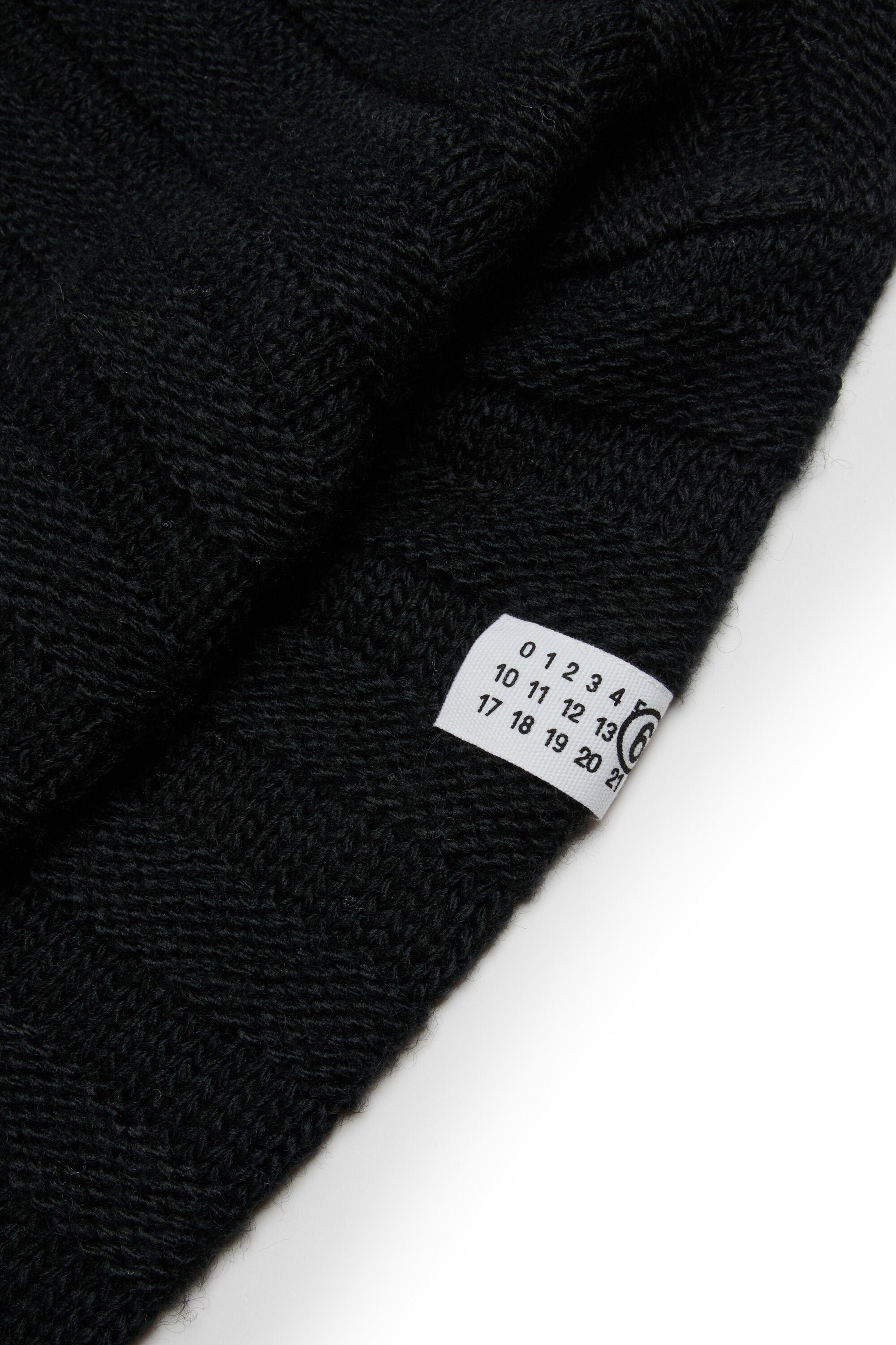 Cardigan in misto lana a coste con rotture