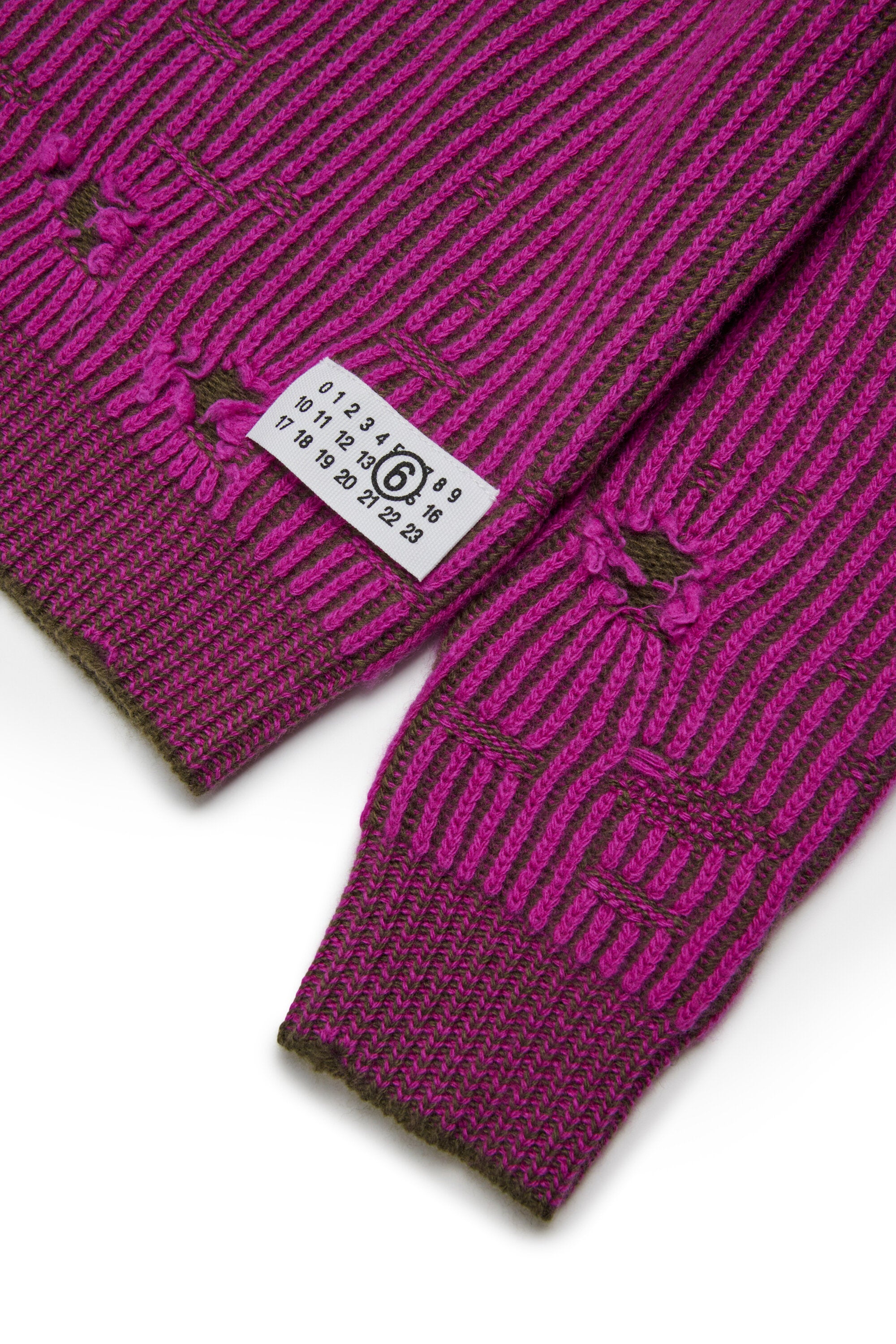 Ribbed wool pullover with breaks