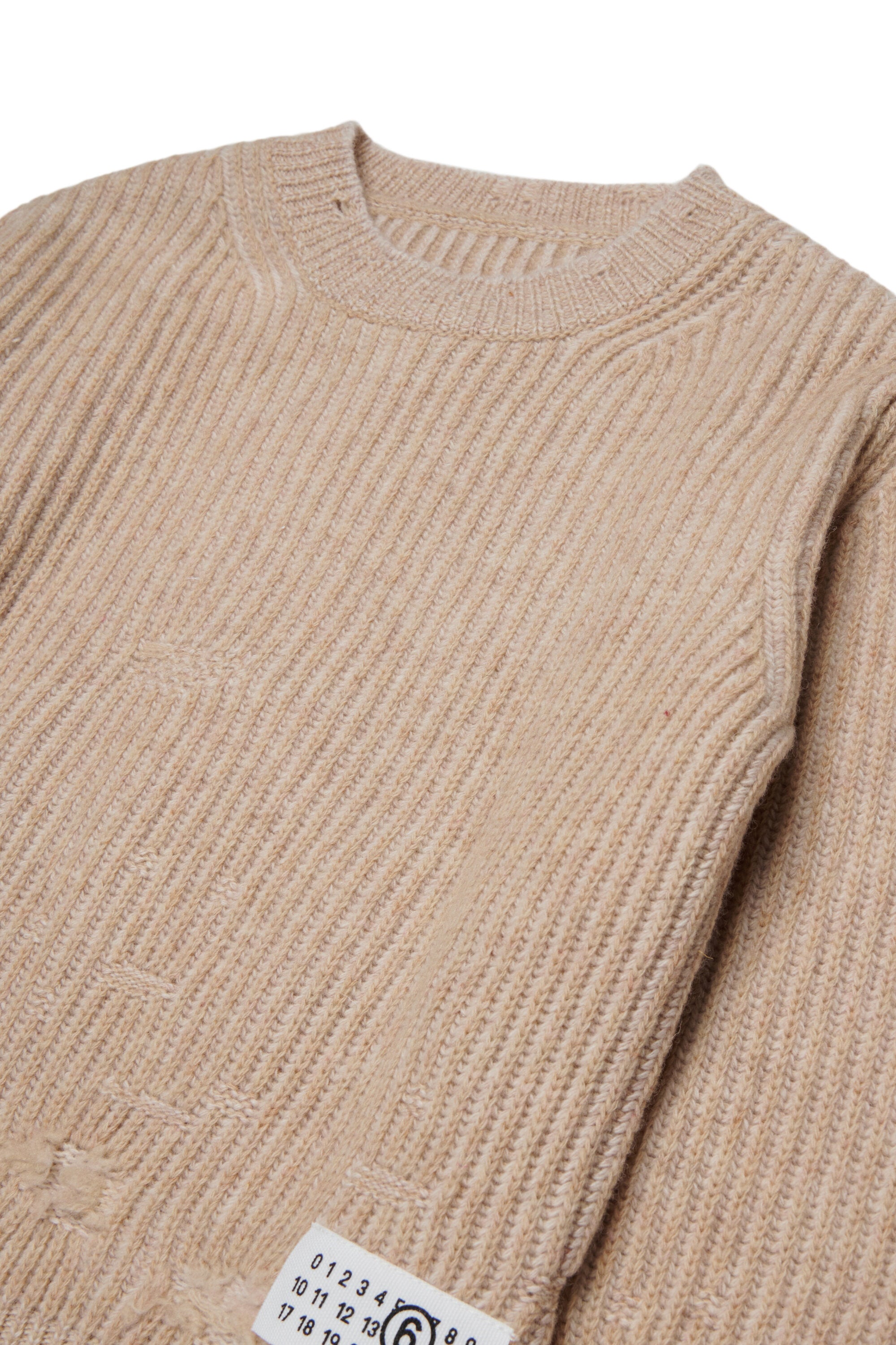 Pullover in lana a coste con rotture