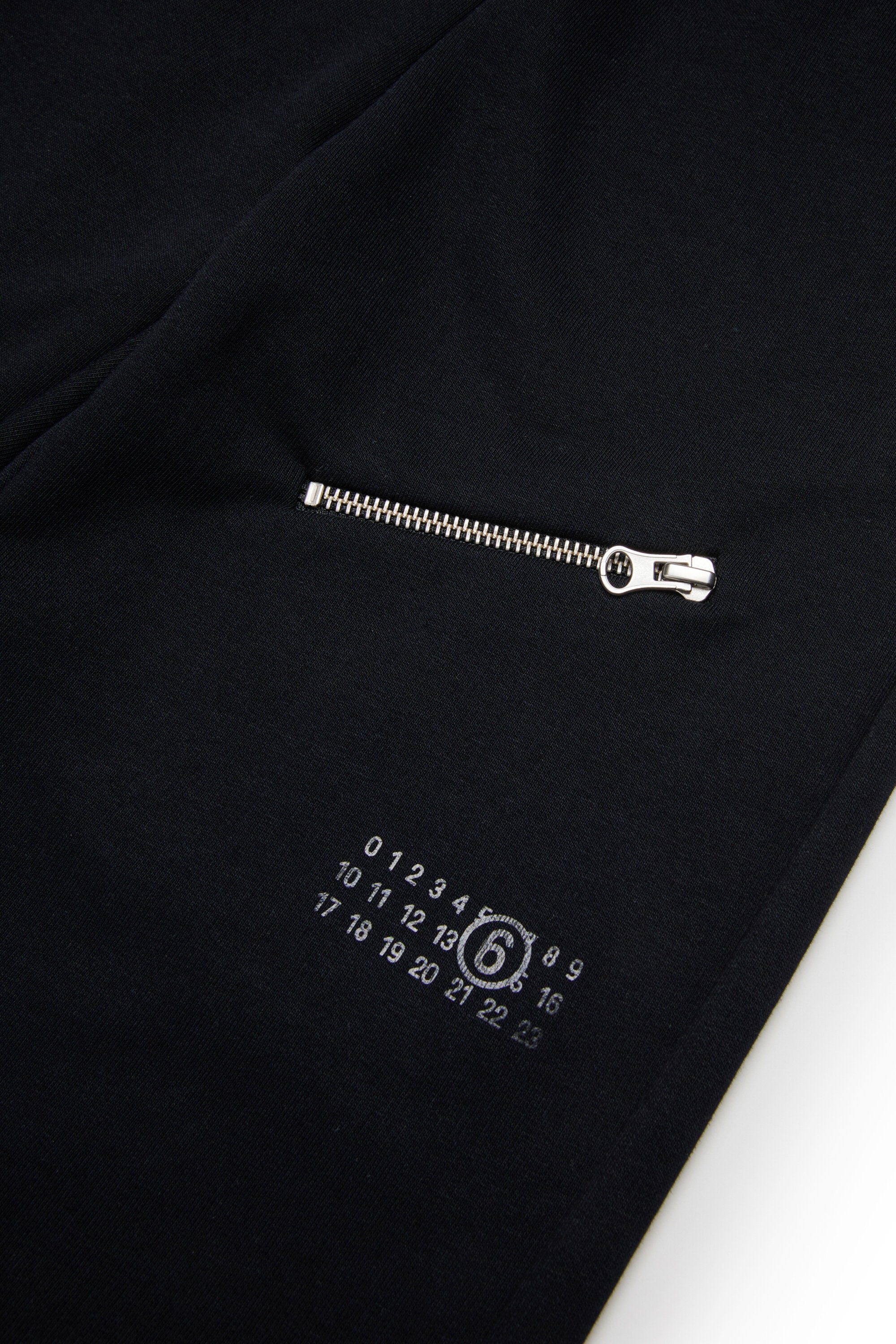 Pantalones sudadera con bolsillos de cremallera