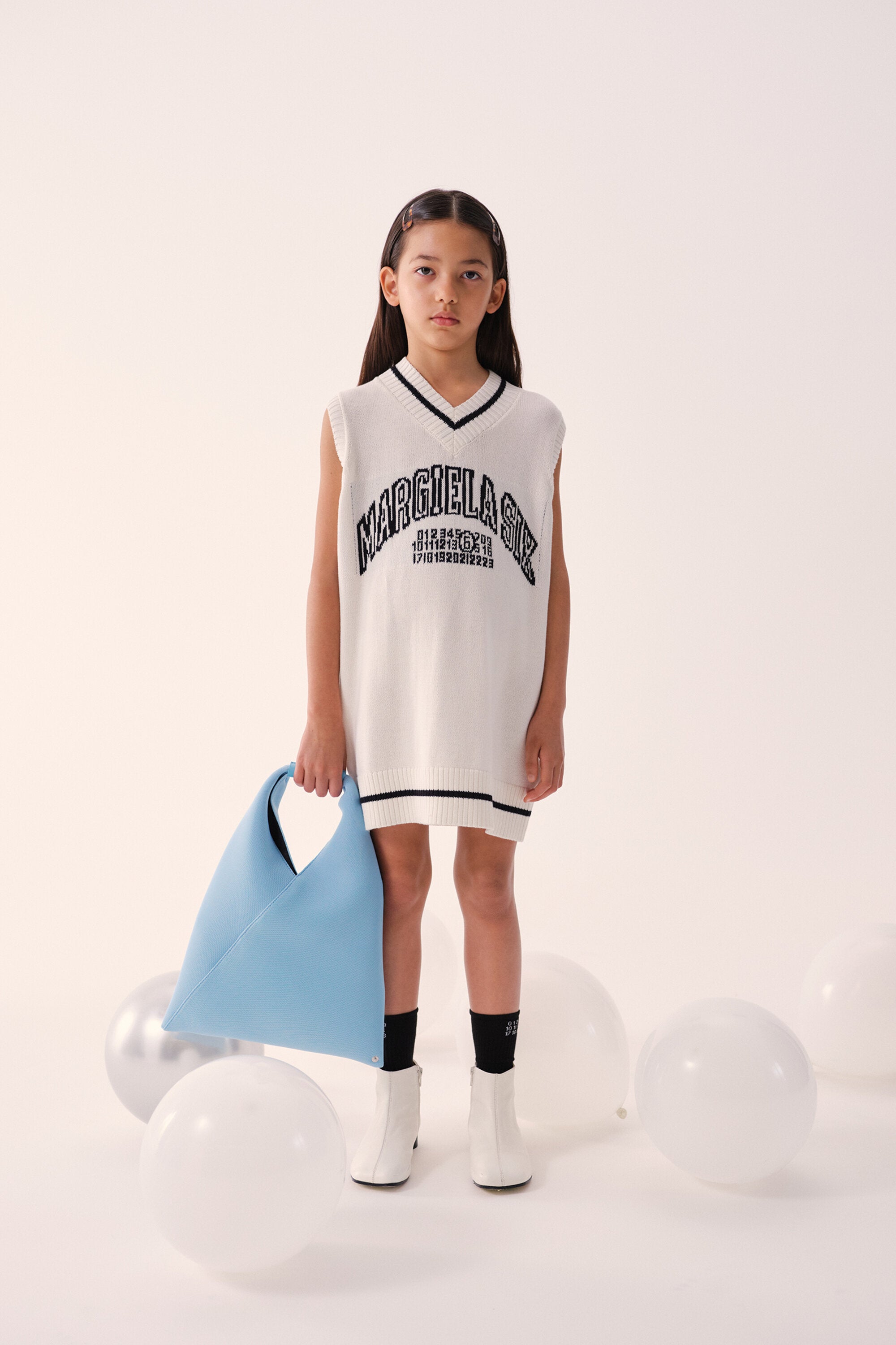 Sleeveless mini dress with V-neckline