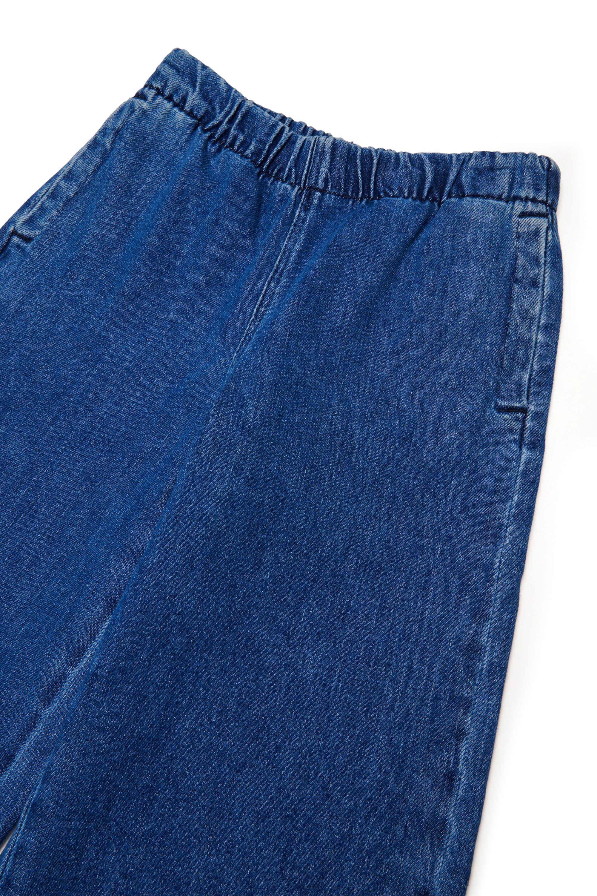 Flare fit jeans with elastic waistband