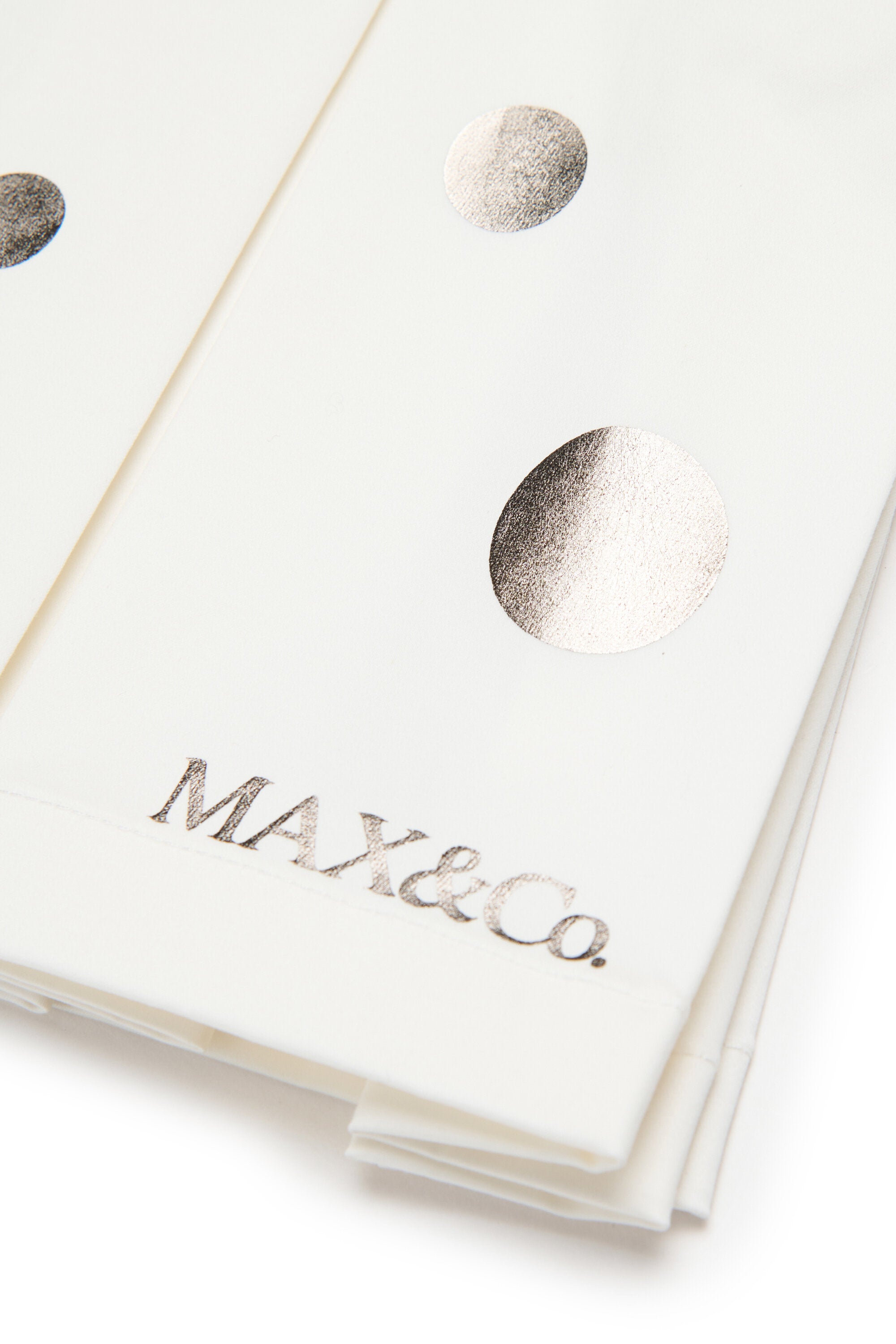 Gonna plissé con pois metallici