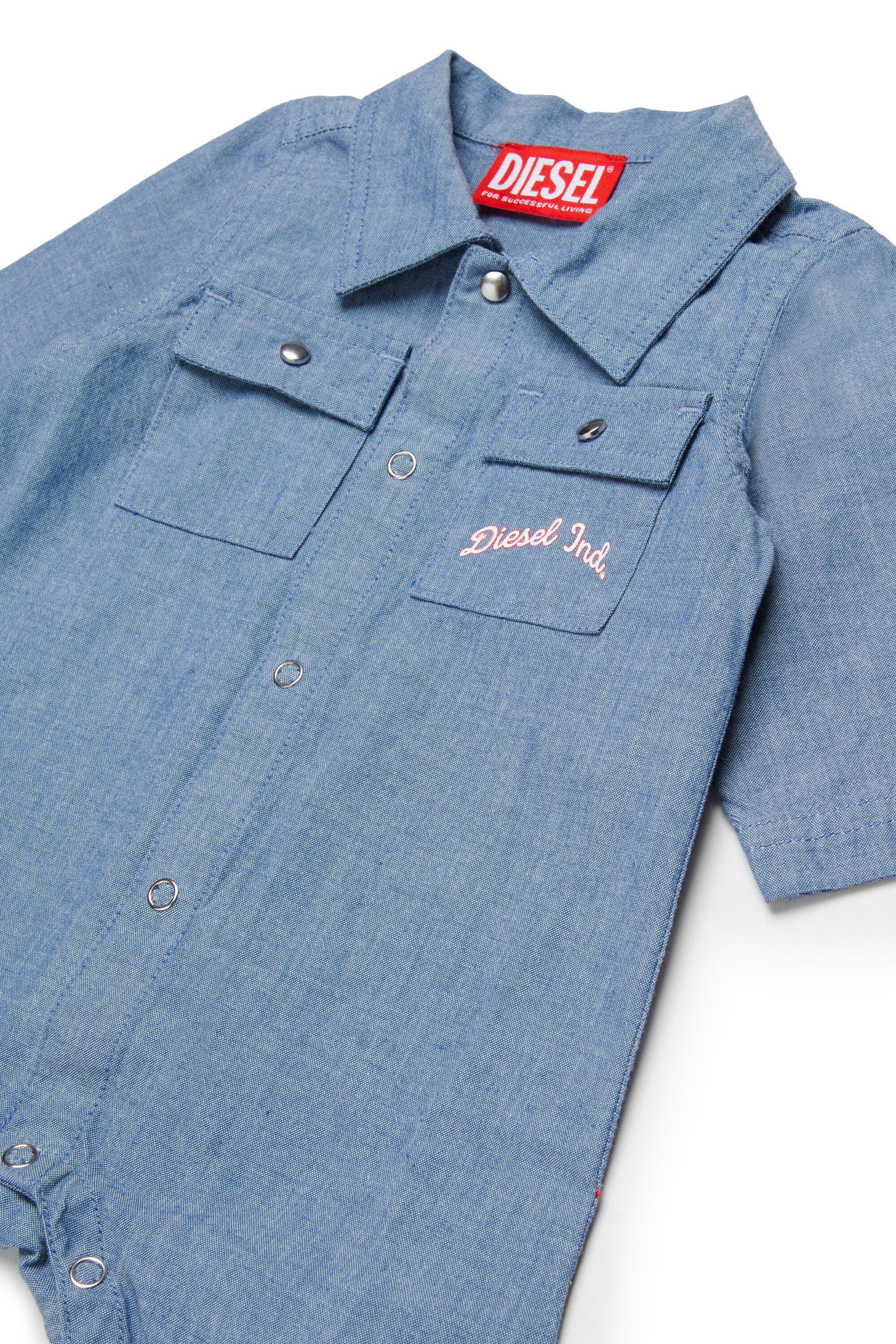 Tuta camicia con logo