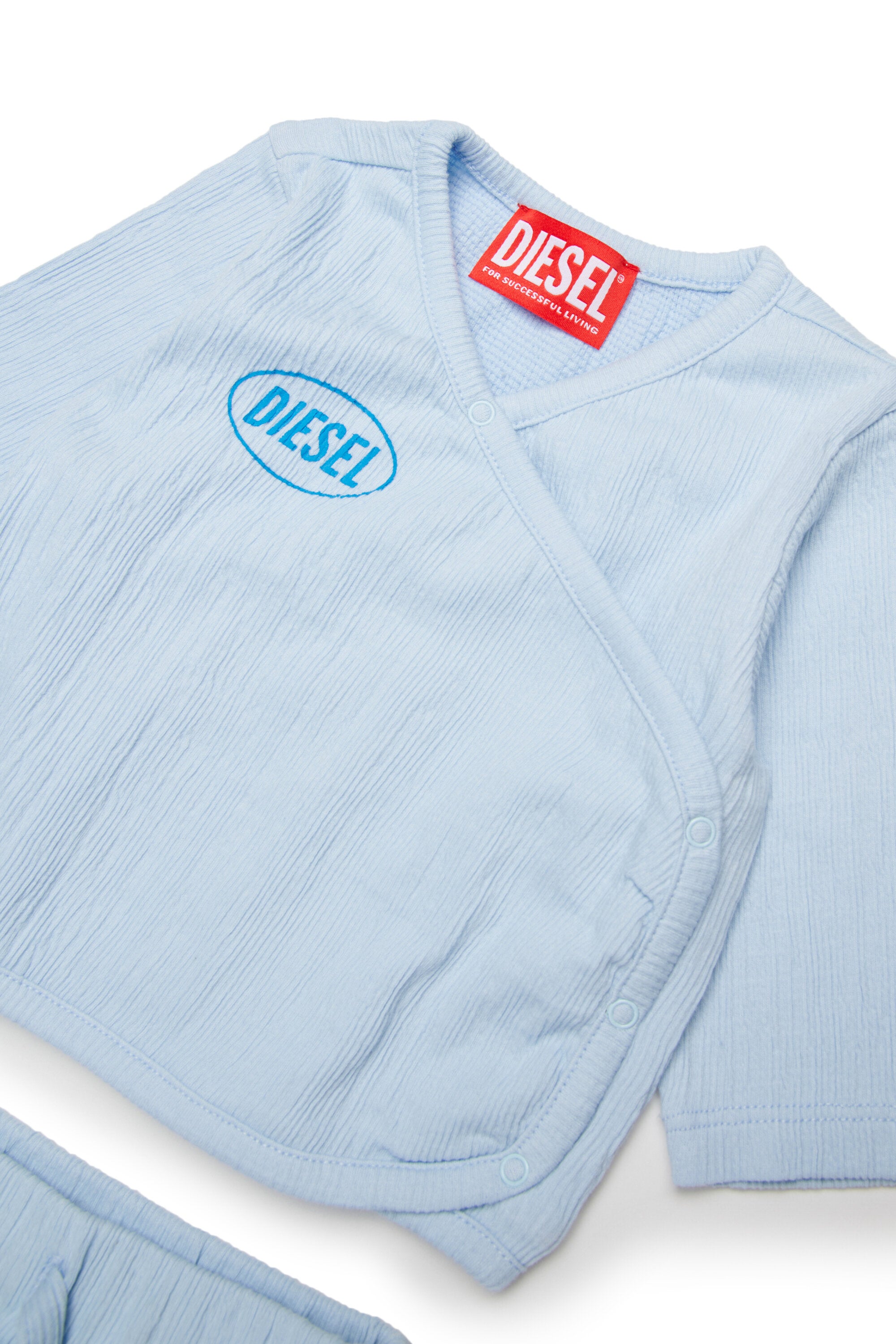 Tuta da neonato con logo