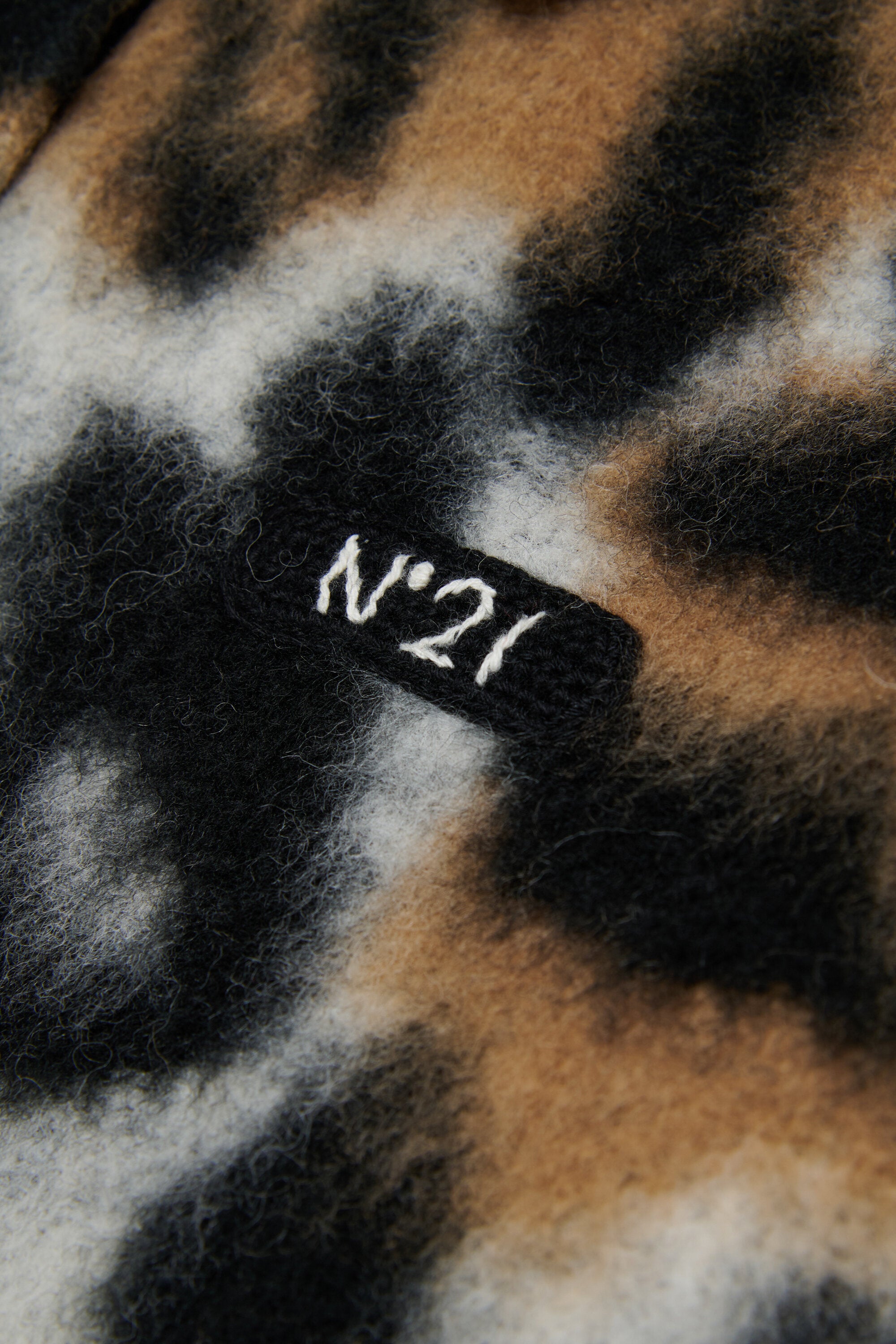 Animal print pullover with collar
