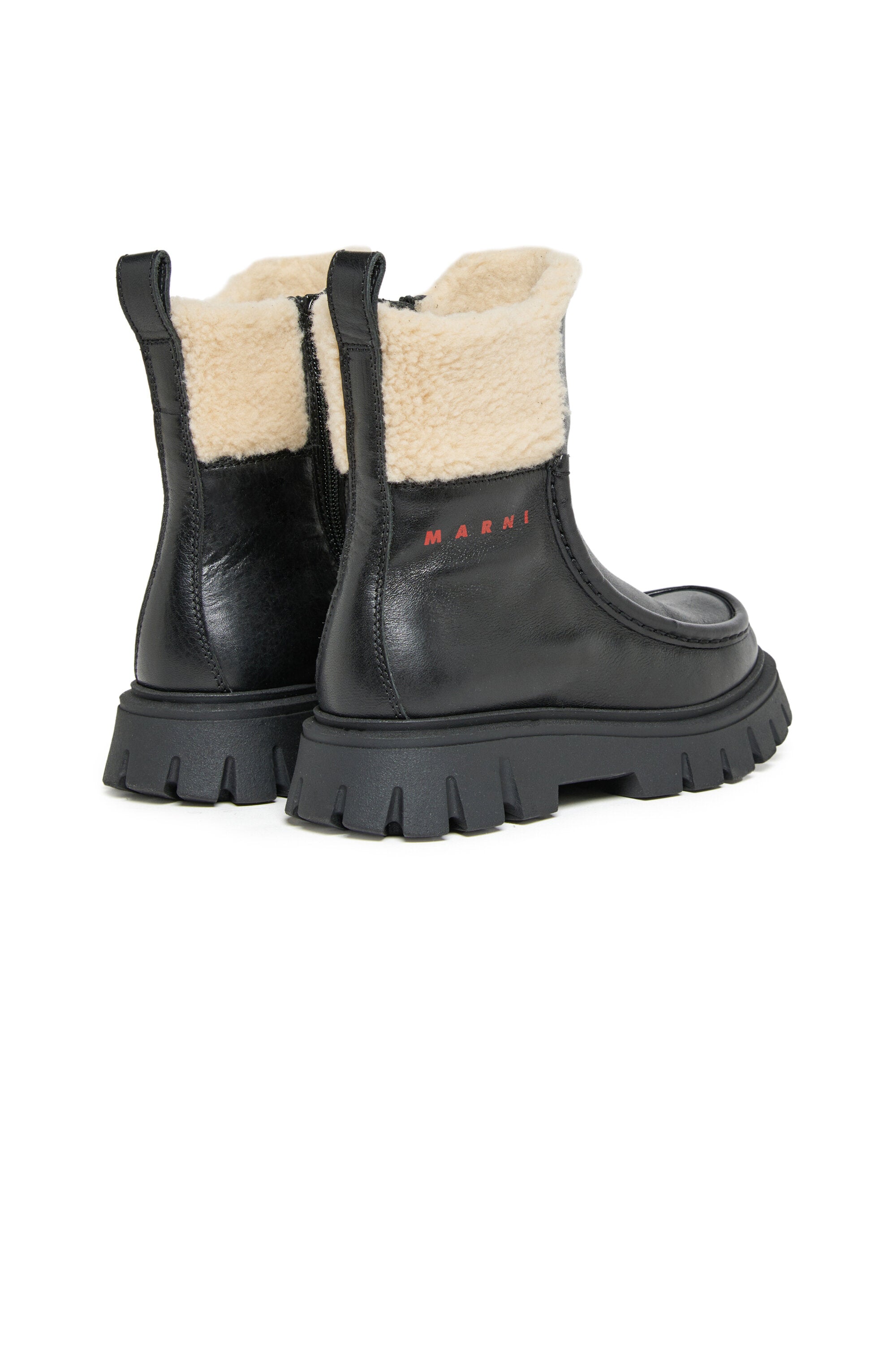Botas Chelsea de piel con cuello de peluche