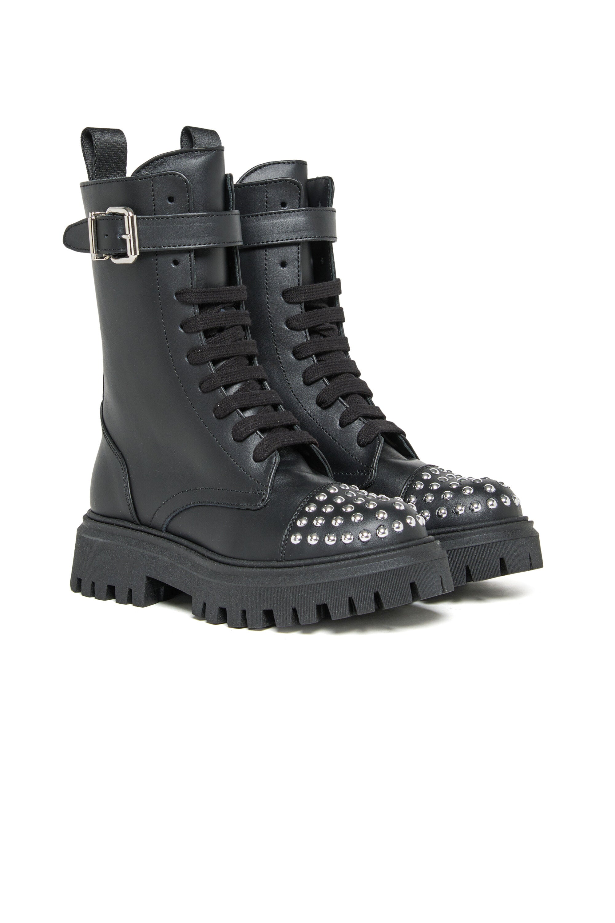 Combat boots with studs on the toe