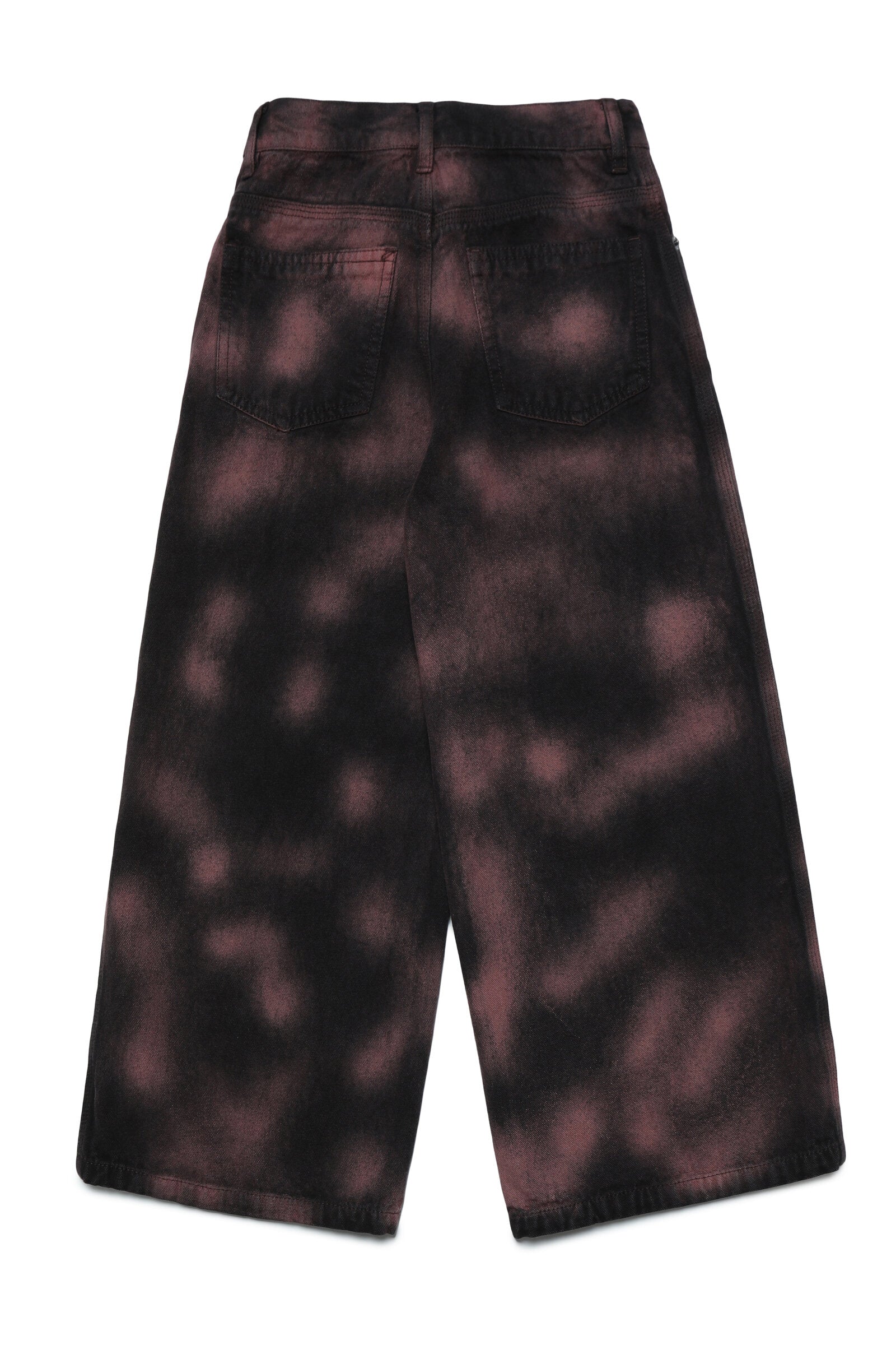 Black denim pants with pink spray effect