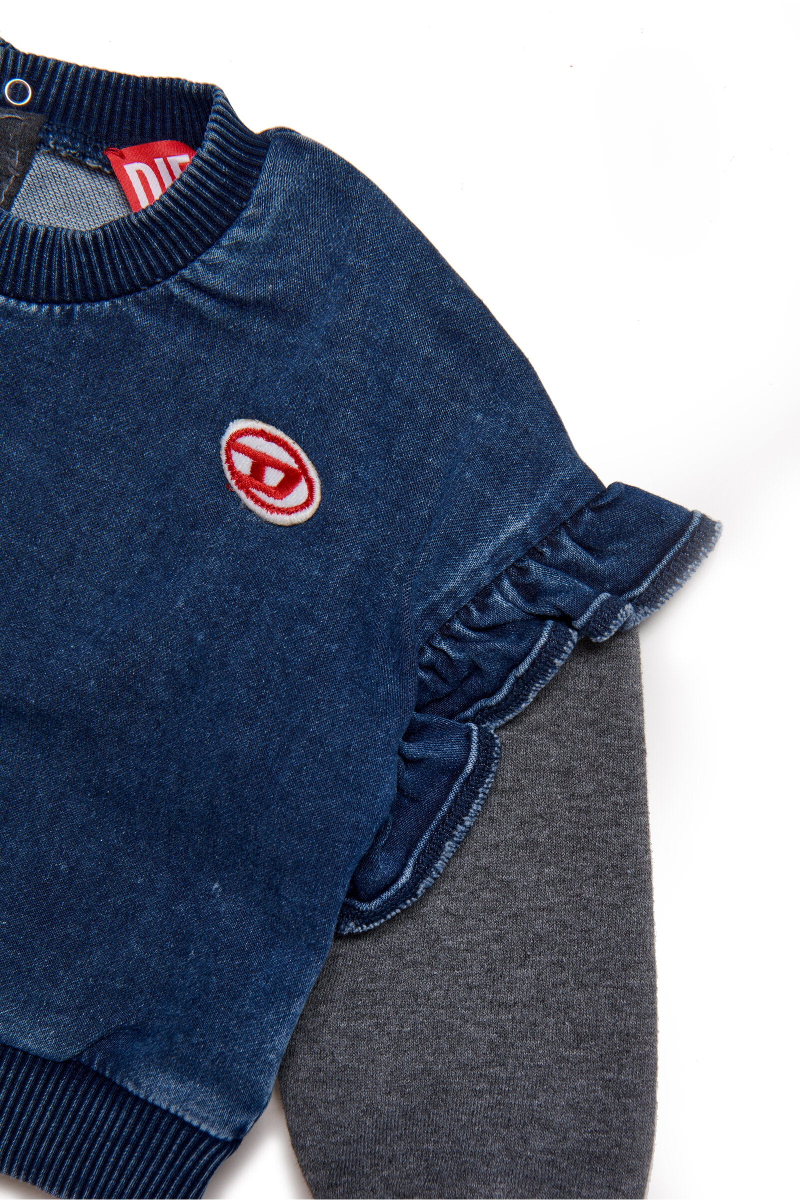 JoggJeans® crewneck sweatshirt with ruffle detail on shoulders