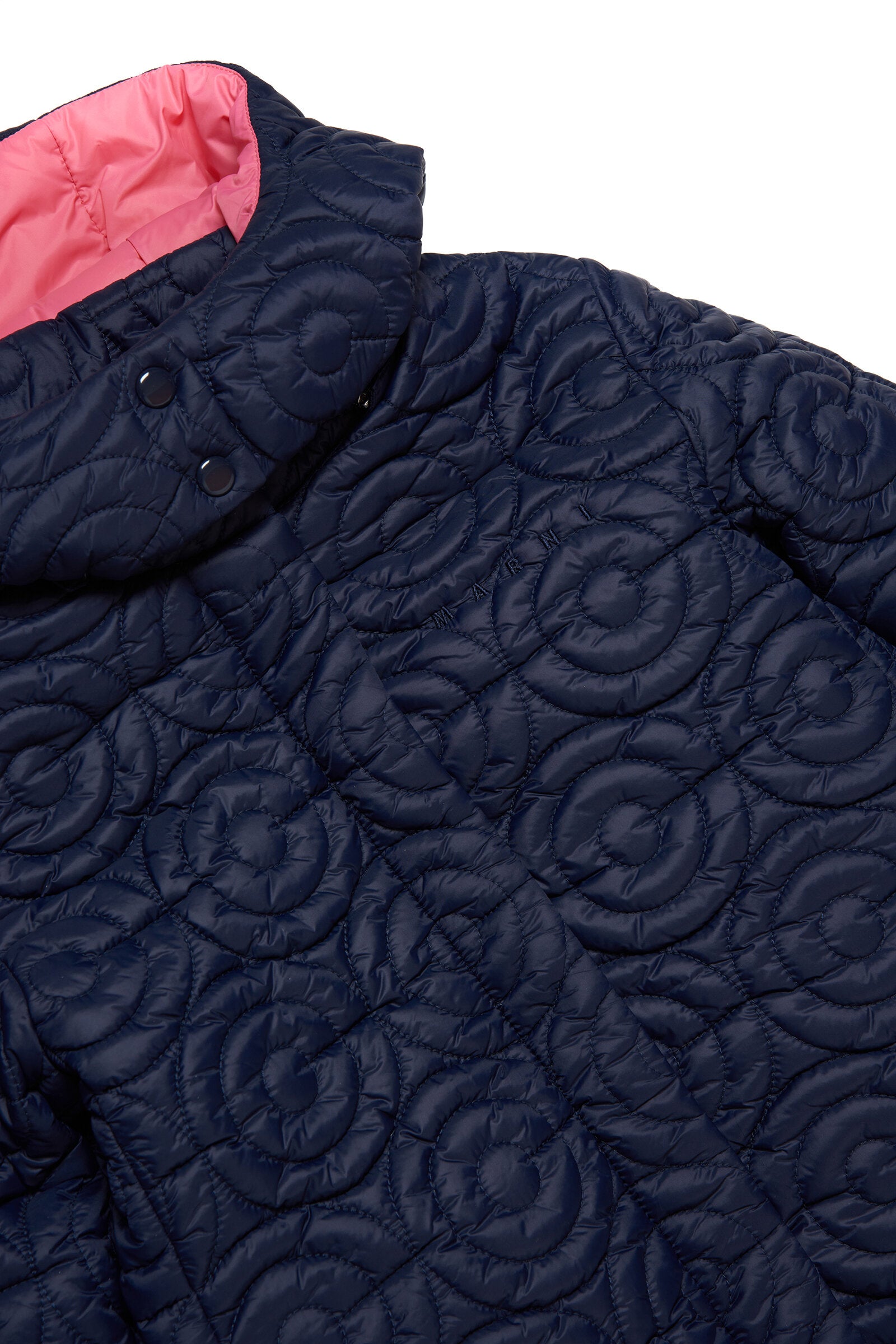 Long padded jacket with allover quilting in circles