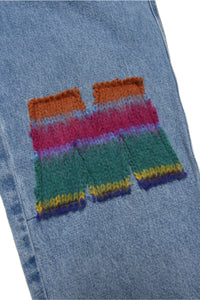 Light blue jeans pants with embroidered flowers and patch