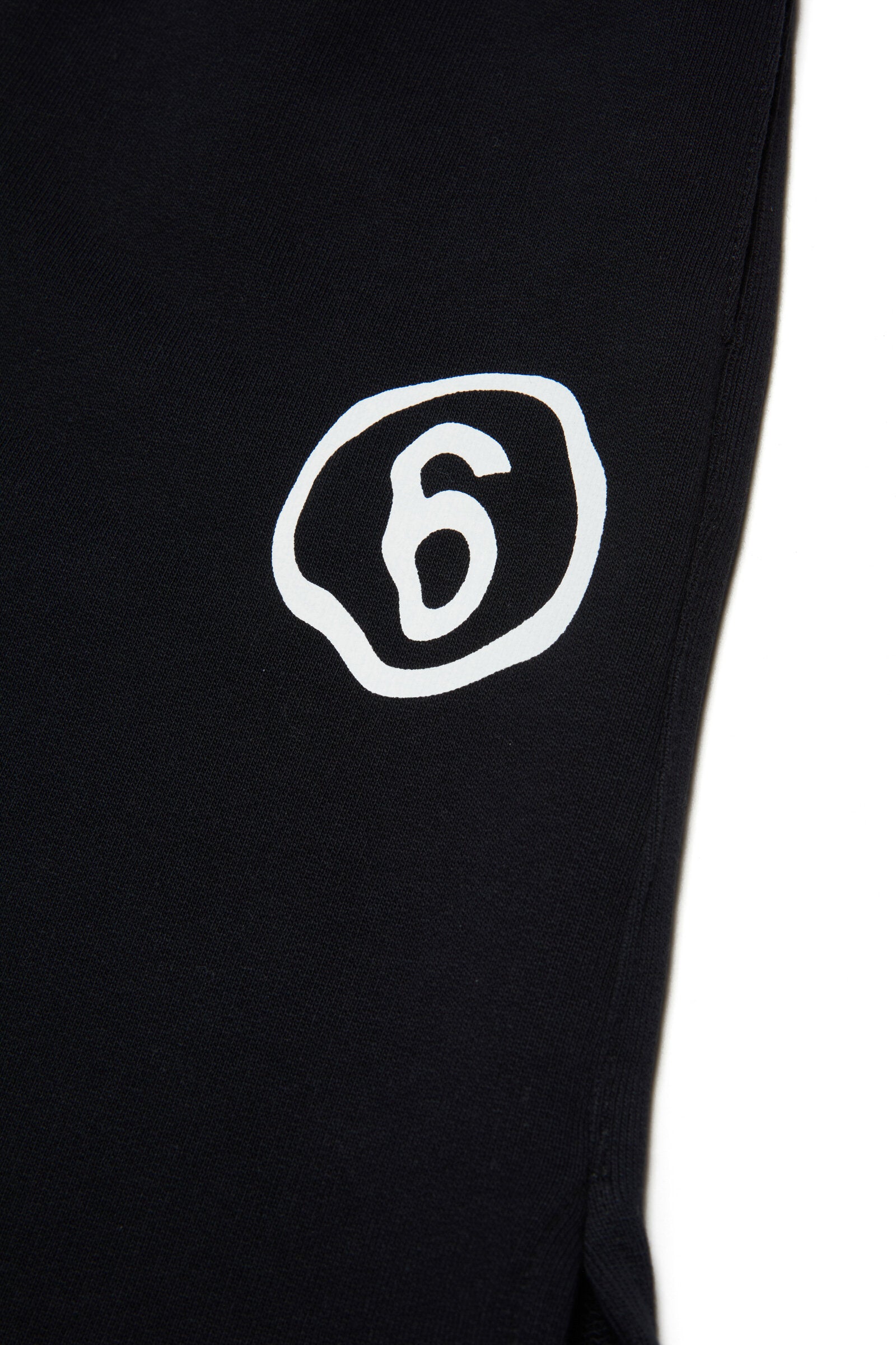 Black fleece shorts with rounded edges and logo
