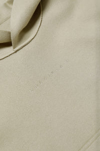Sudadera corta de tela con capucha y aberturas laterales en la parte inferior