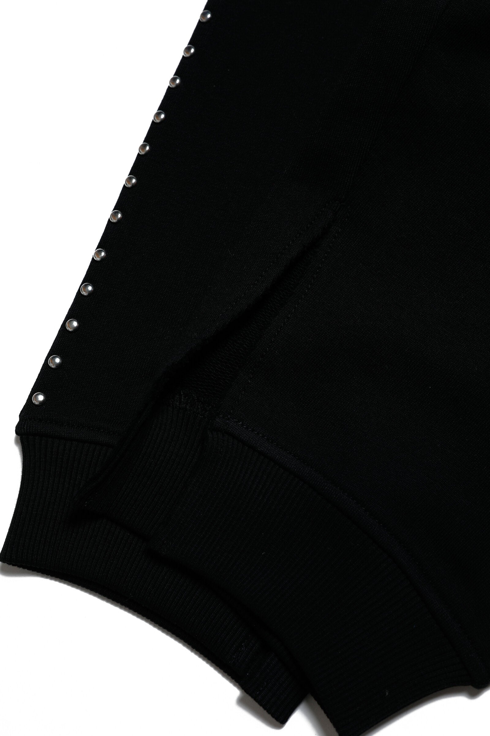 Jogger pants in fleece with studded details