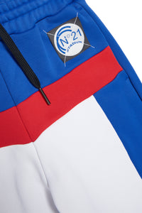 Blue trousers with 80s Stadium logo